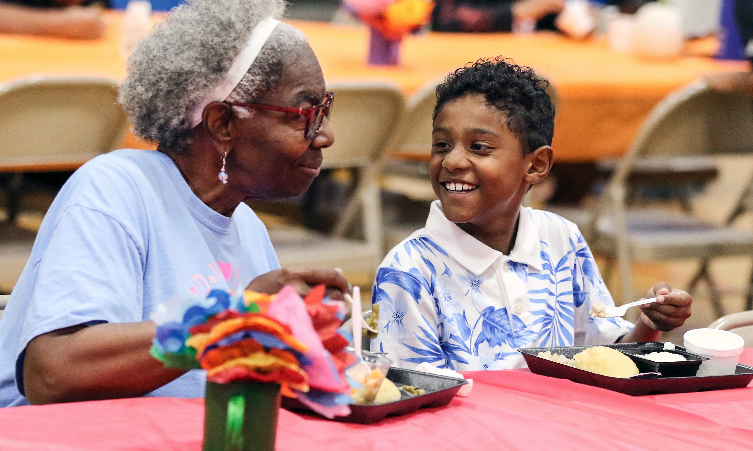 FILE - Third-grader Dallin Curry, 8, smiles as he talks with his grandmother, Mary Durr, Sept. 6, 2024, during a Grandparents Day celebration in the lunchroom at Burns Elementary School in Owensboro, Ky. (Alan Warren/The Messenger-Inquirer via AP, File)