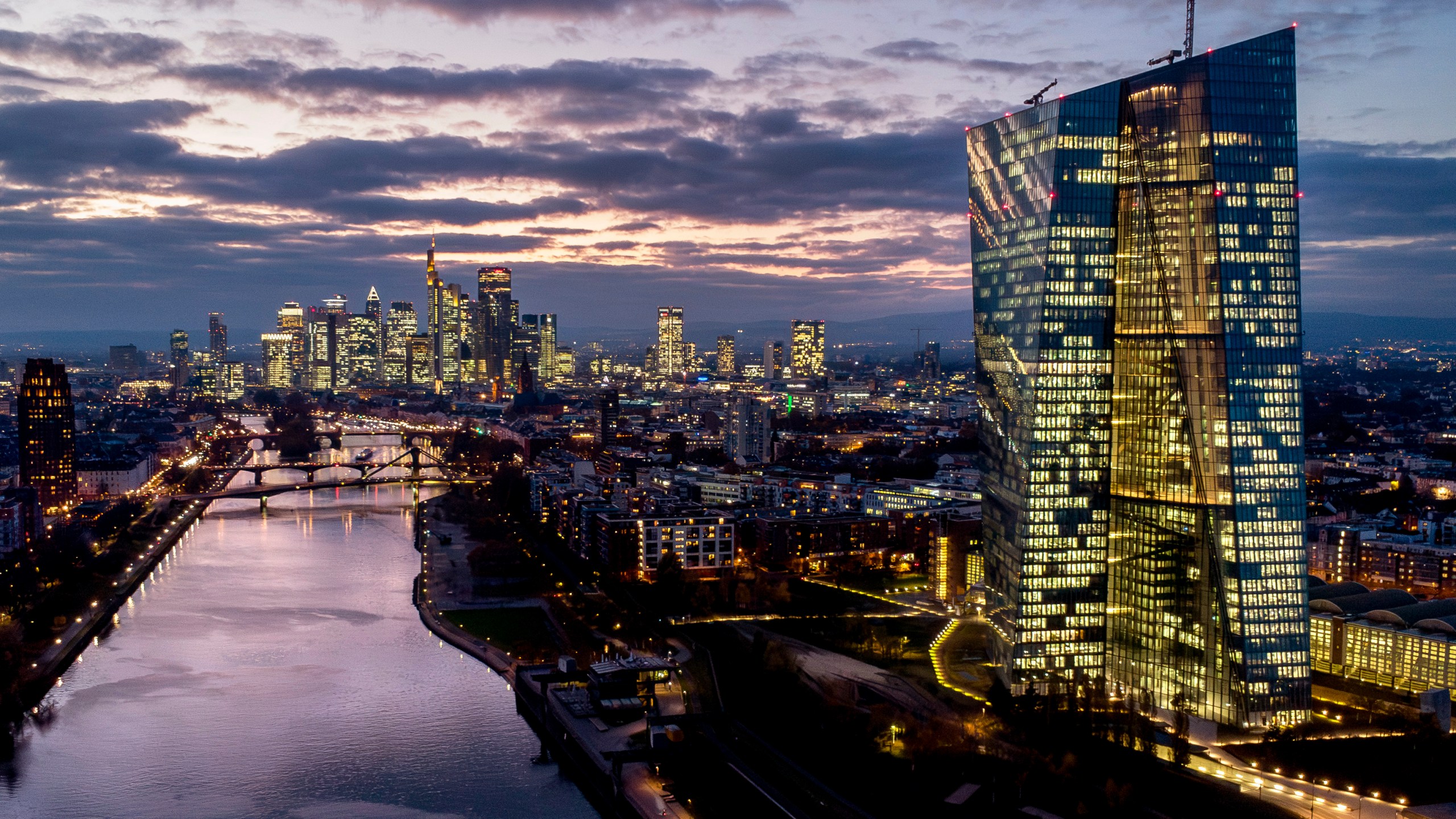 FILE - The European Central Bank, right, stands amid buildings in the banking district of Frankfurt, Germany, Nov. 12, 2024. (AP Photo/Michael Probst, File)