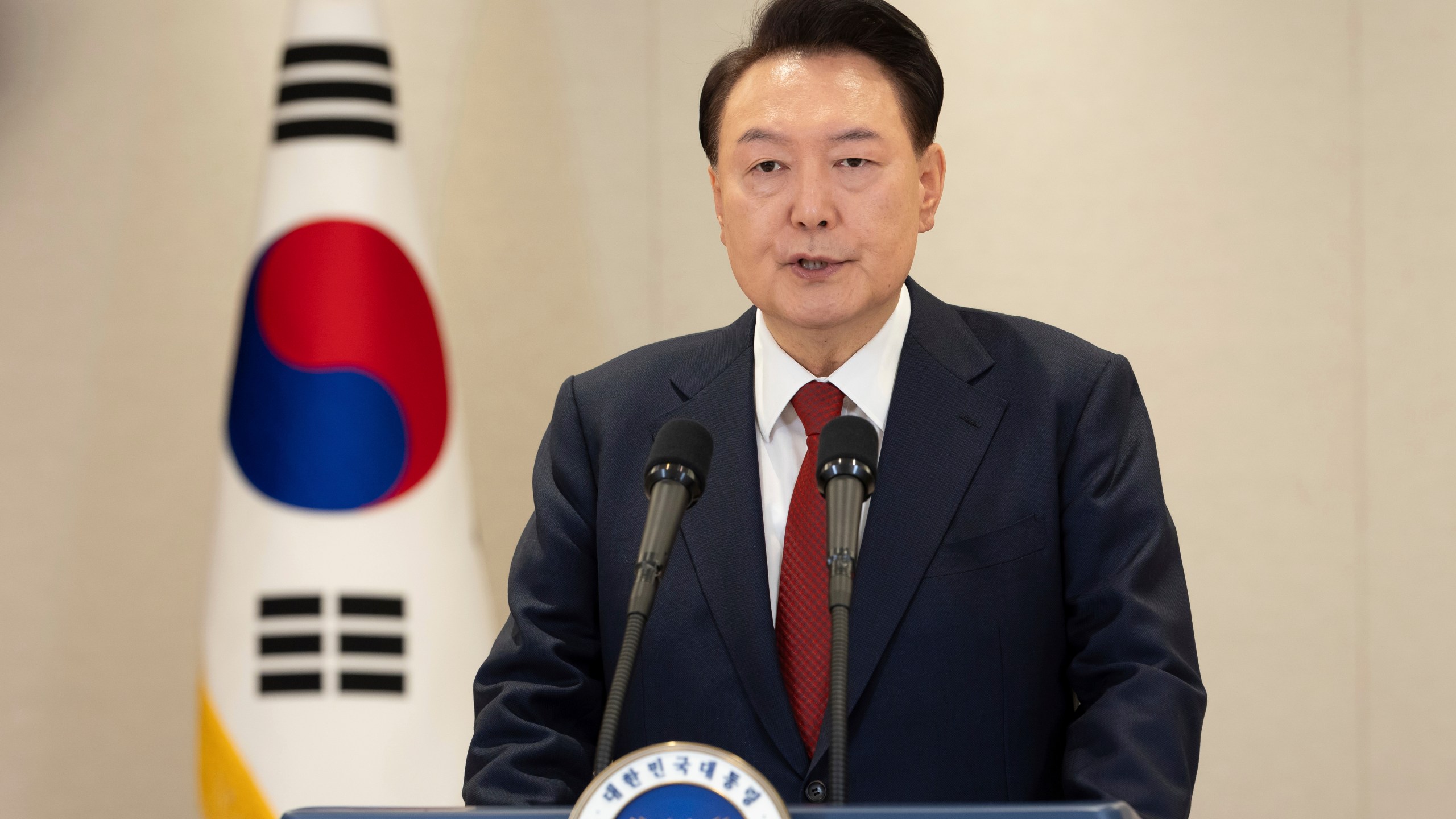 In this photo provided by South Korea Presidential Office, South Korean President Yoon Suk Yeol speaks at the presidential office in Seoul, South Korea, Thursday, Dec. 12, 2024. (South Korea Presidential Office via AP)