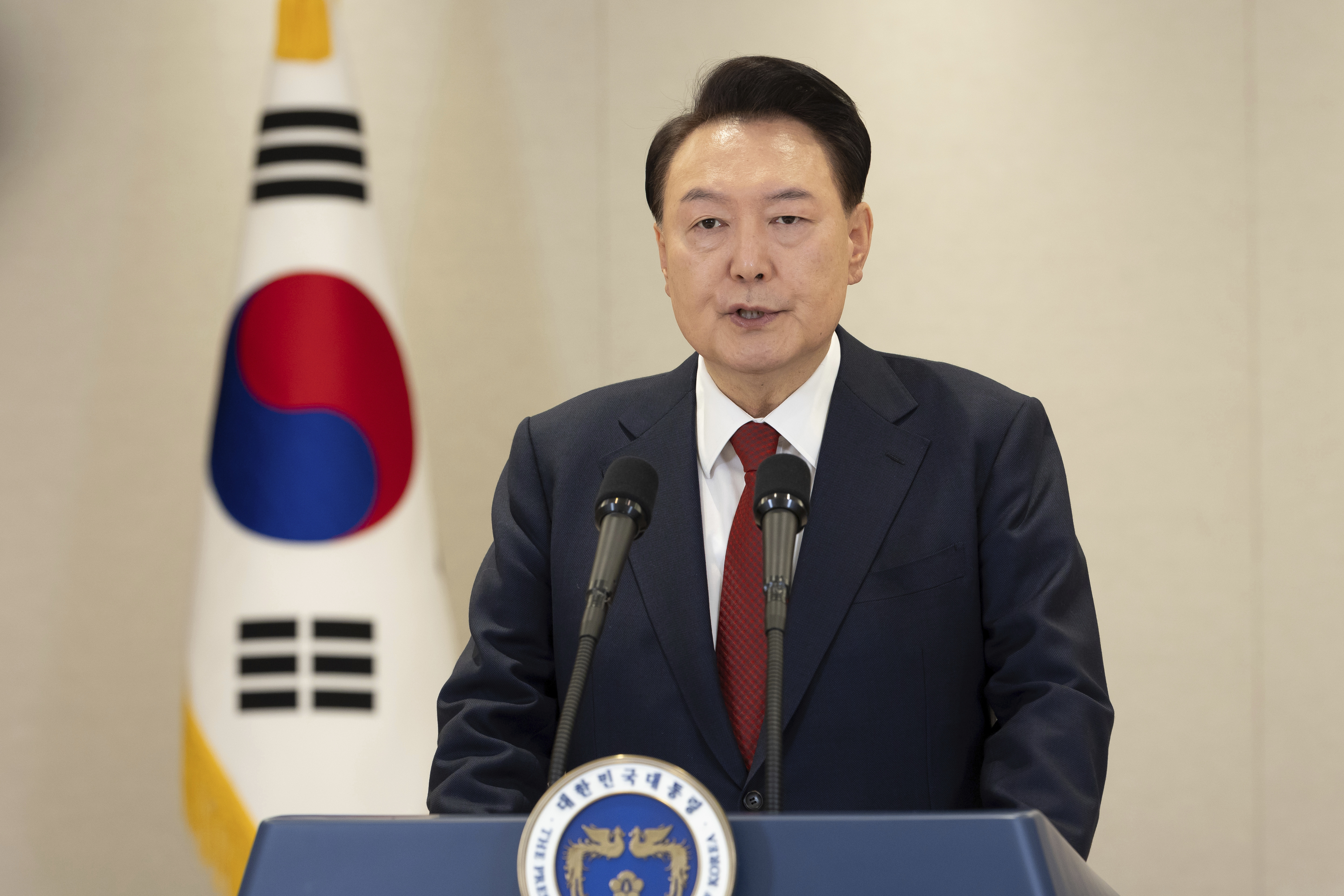 In this photo provided by South Korea Presidential Office, South Korean President Yoon Suk Yeol speaks at the presidential office in Seoul, South Korea, Thursday, Dec. 12, 2024. (South Korea Presidential Office via AP)