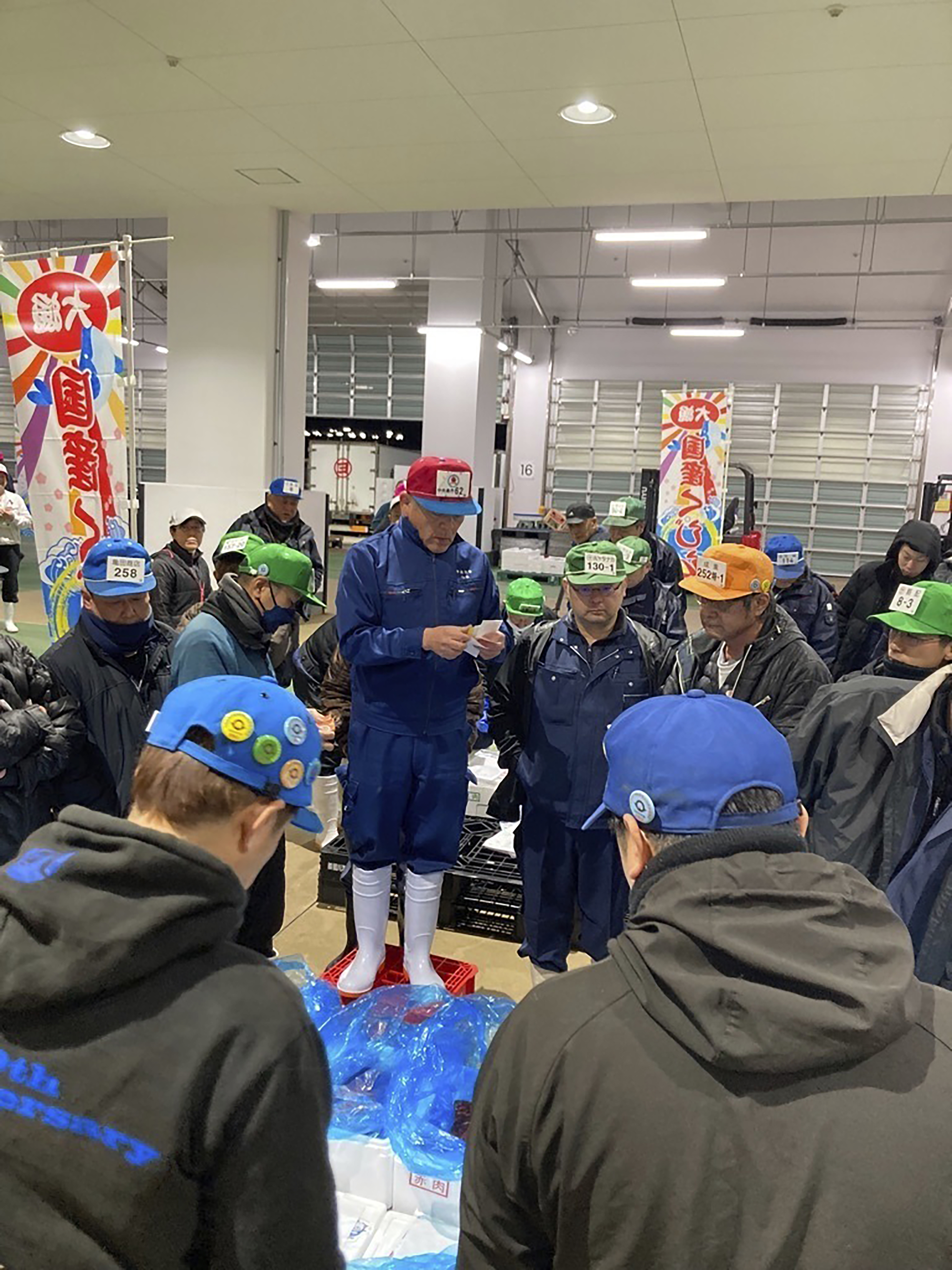 This photo released by Shimonoseki City, Agriculture, Forestry and Fisheries Maintenance Division shows an auction selling fresh meat of fin whales at a fish market in Shimonoseki, Yamaguchi prefecture, southern Japan Thursday, Dec. 12, 2024. (Shimonoseki City, Agriculture, Forestry and Fisheries Maintenance Division via AP)