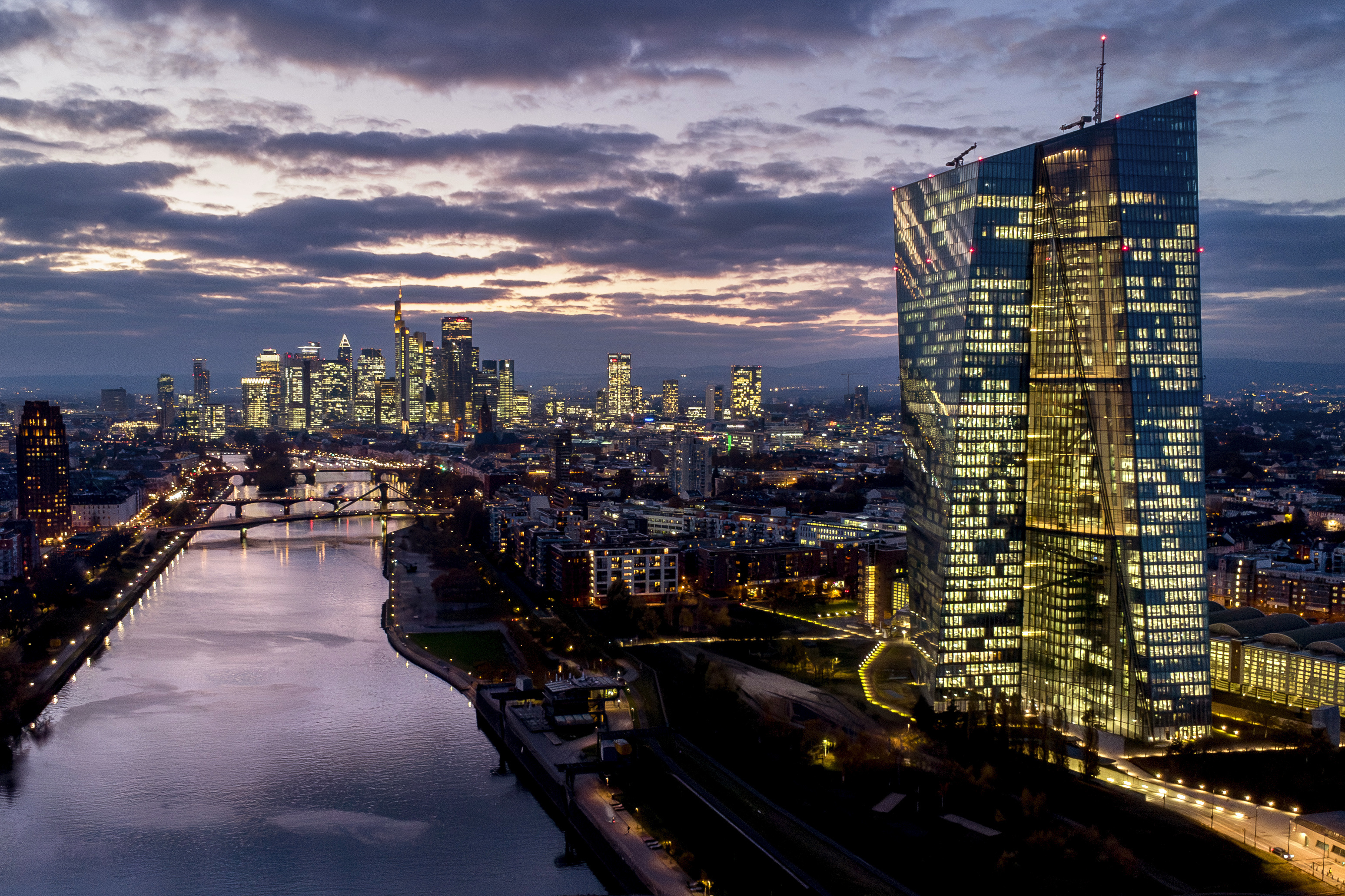 FILE - The European Central Bank, right, stands amid buildings in the banking district of Frankfurt, Germany, Nov. 12, 2024. (AP Photo/Michael Probst, File)