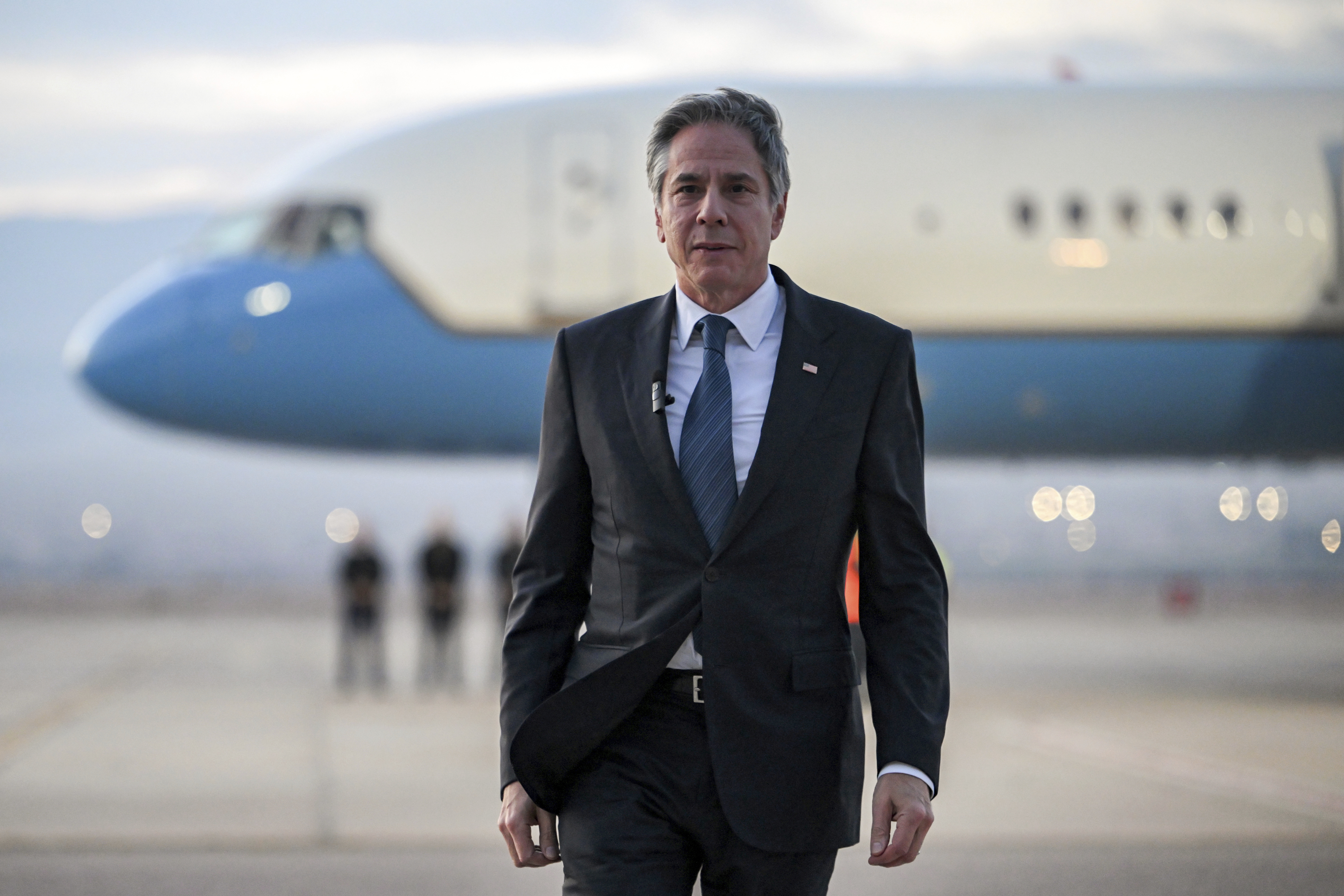 US Secretary of State Antony Blinken walks on the tarmac to speaks to reporters before his departure from King Hussein International Airport in Jordan's southern Red Sea coastal city of Aqaba, Jordan, Thursday, Dec. 12, 2024. (Andrew Caballero-Reynolds/Pool Photo via AP)