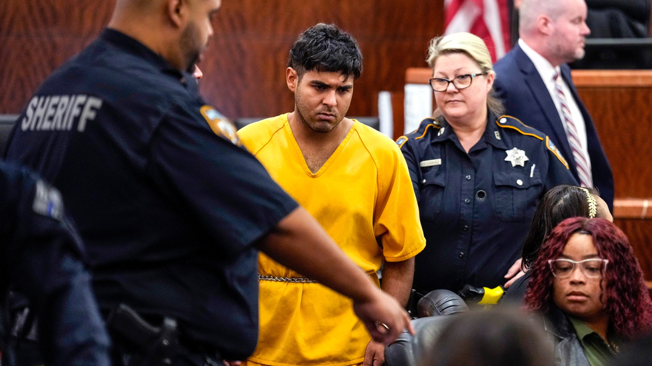 FILE - Johan Jose Martinez-Rangel, one of the two men accused of killing 12-year-old Jocelyn Nungaray, is led from the courtroom by deputies on Tuesday, June 25, 2024 in Houston. (Brett Coomer/Houston Chronicle via AP, File)