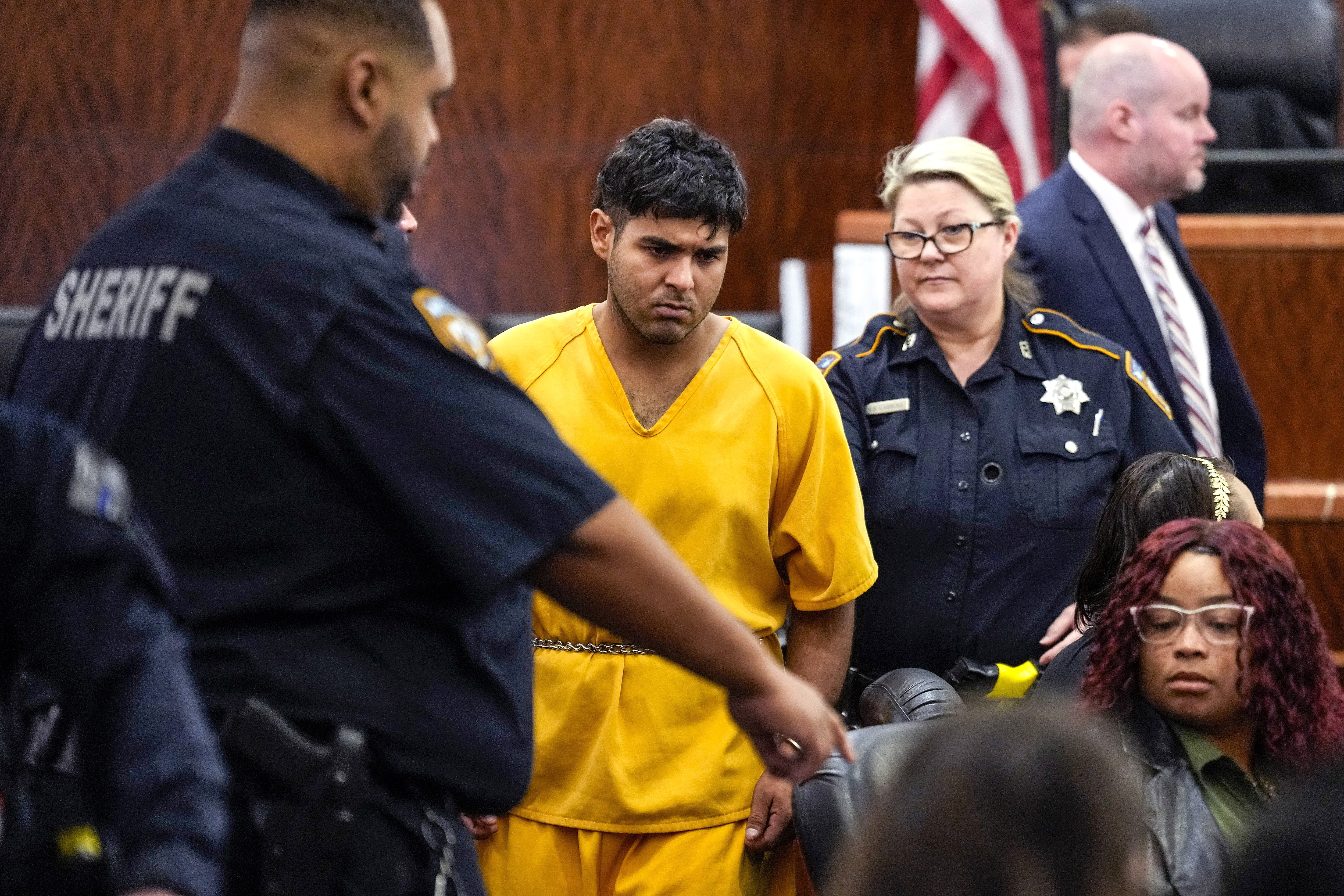 FILE - Johan Jose Martinez-Rangel, one of the two men accused of killing 12-year-old Jocelyn Nungaray, is led from the courtroom by deputies on Tuesday, June 25, 2024 in Houston. (Brett Coomer/Houston Chronicle via AP, File)