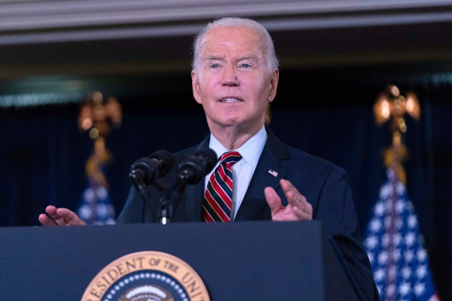 President Joe Biden delivers his remarks at the Democratic National Committee's Holiday Reception at Willard Hotel in Washington, Sunday, Dec. 15, 2024. (AP Photo/Jose Luis Magana)