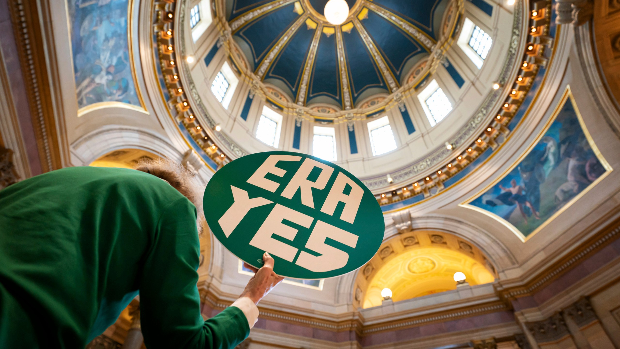 FILE - ERA YES sign in the State Capitol Rotunda during a rally for the Equal Rights Amendment, Jan. 31, 2022 in St. Paul, Minn. (Glen Stubbe/Star Tribune via AP, File)