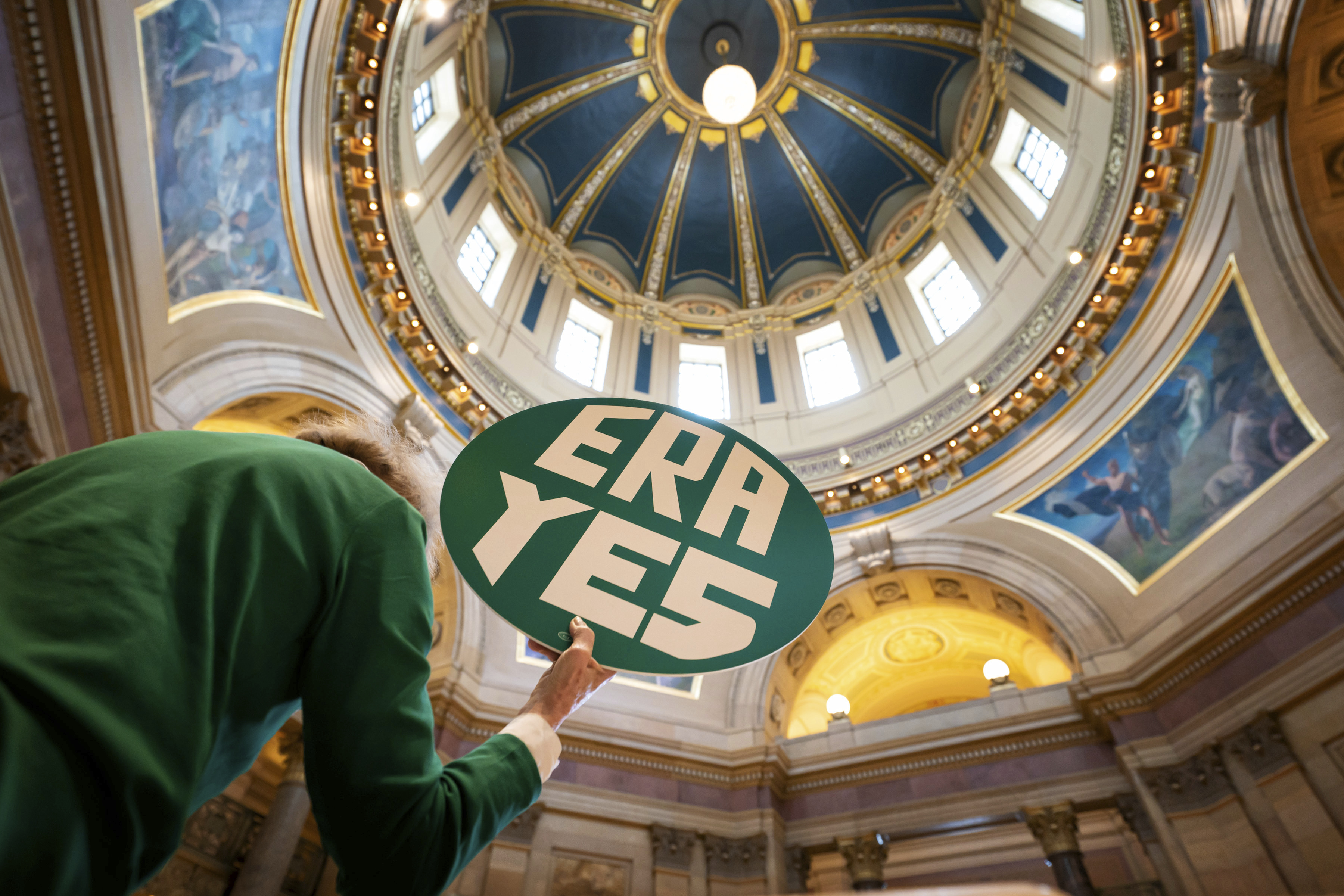 FILE - ERA YES sign in the State Capitol Rotunda during a rally for the Equal Rights Amendment, Jan. 31, 2022 in St. Paul, Minn. (Glen Stubbe/Star Tribune via AP, File)