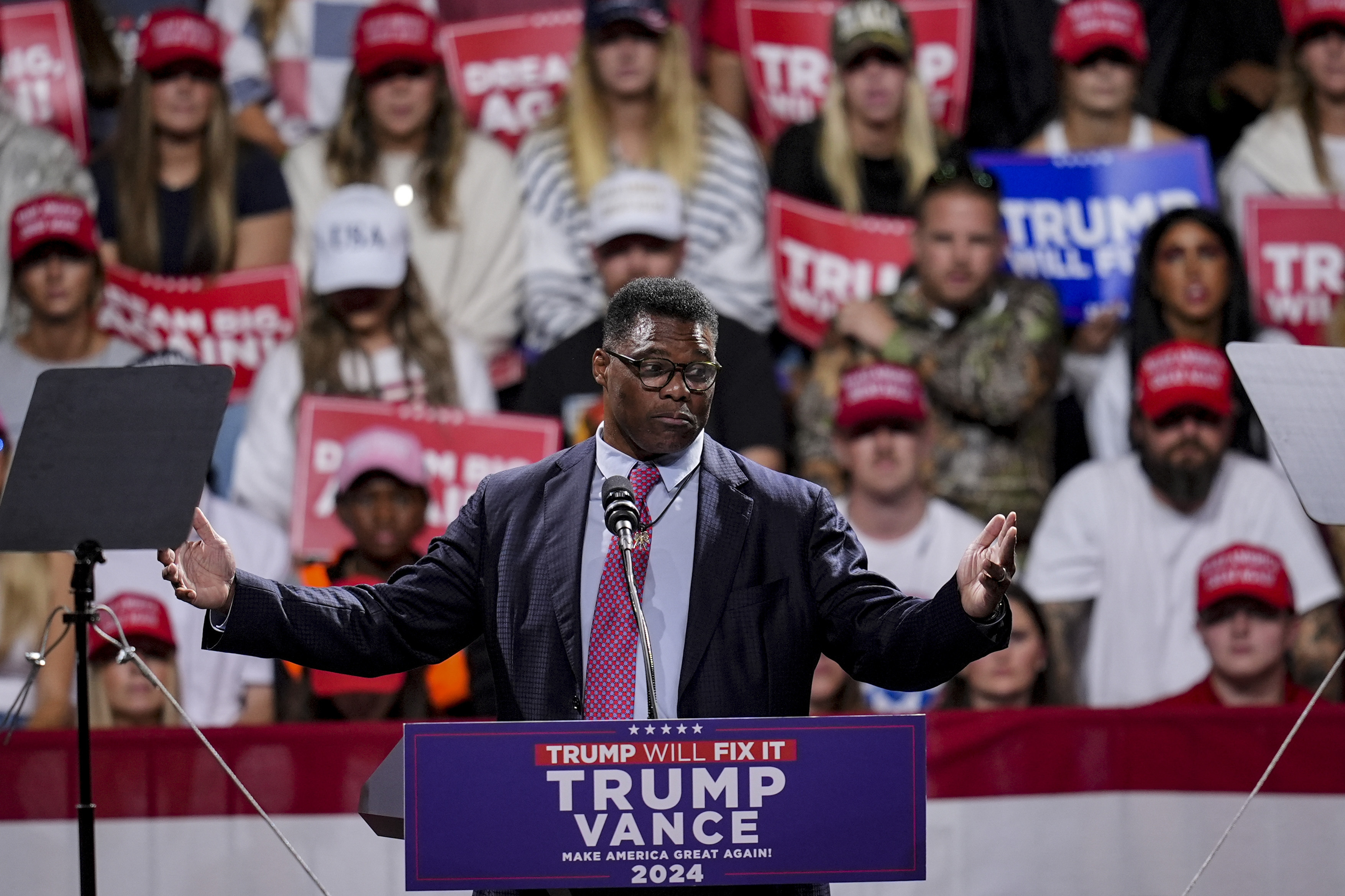 FILE - Herschel Walker speaks during a campaign rally at Atrium Health Amphitheater for Republican presidential nominee former President Donald Trump, Nov. 3, 2024, in Macon, Ga. (AP Photo/Mike Stewart)