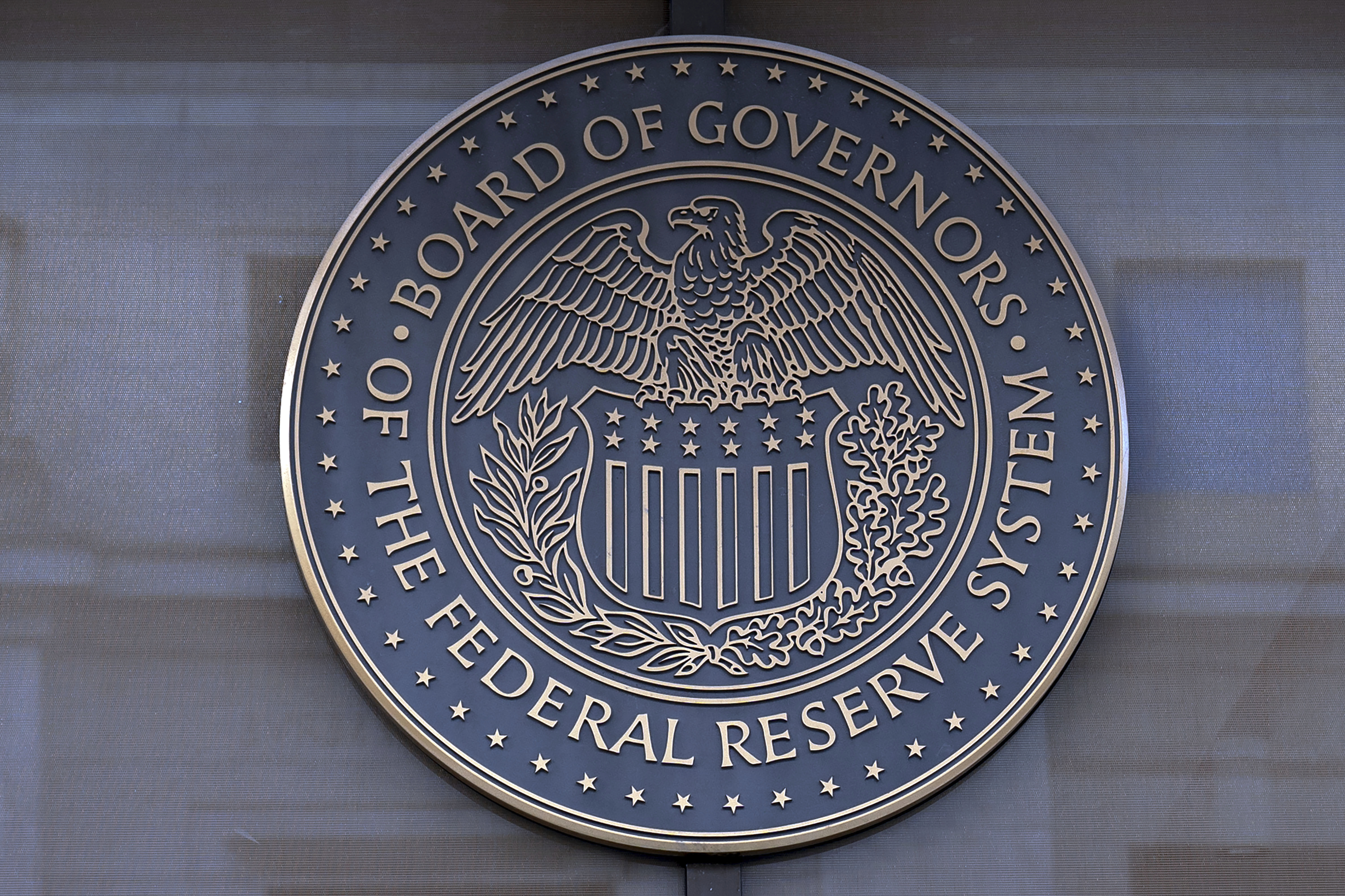 FILE - The seal of the Federal Reserve Board is seen at the building in Washington, Dec. 8, 2024. (AP Photo/Jose Luis Magana, File)