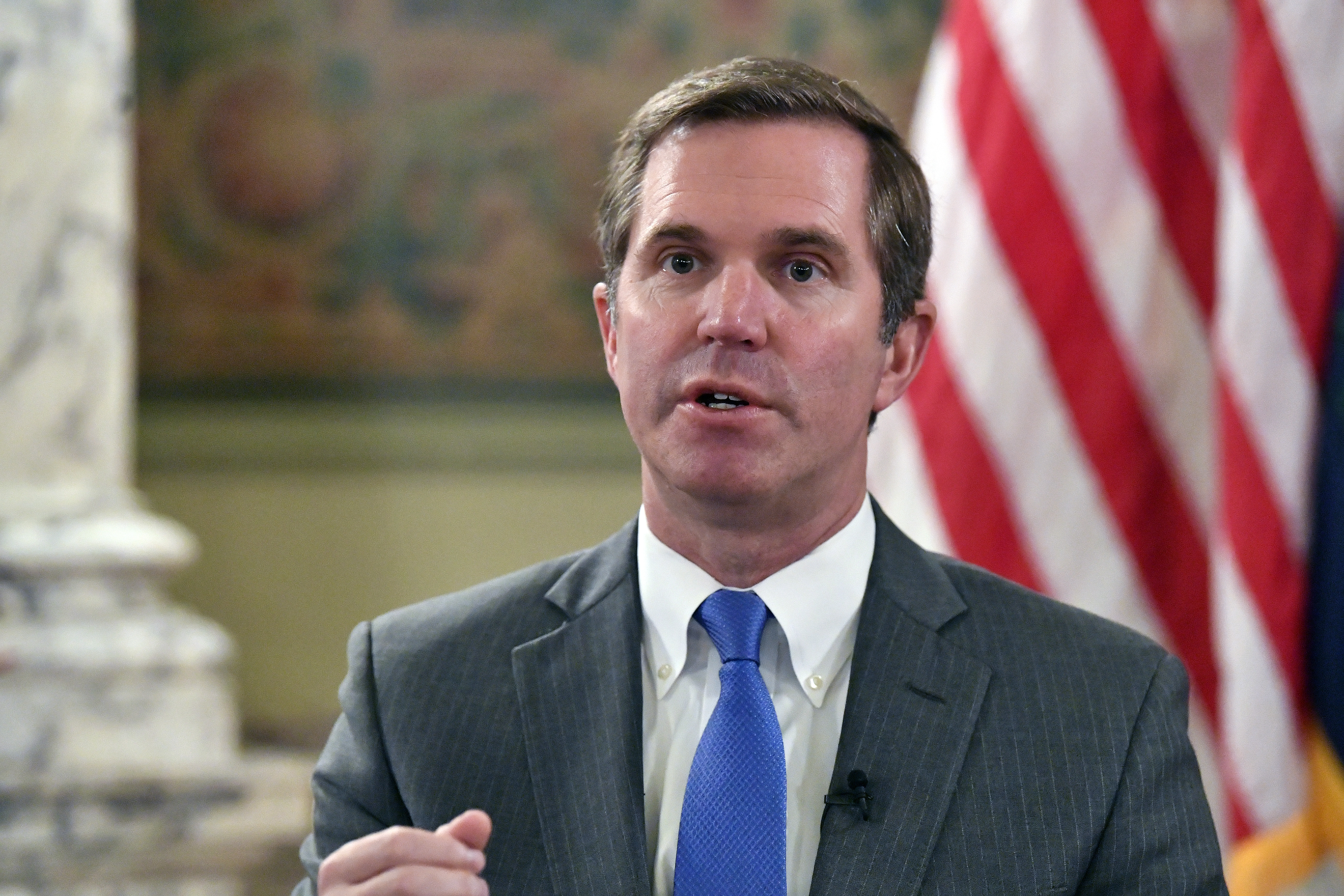 Kentucky Gov. Andy Beshear talks about the gains in the economic growth f the state during the past year in Frankfort, Ky., Wednesday, Dec. 18, 2024. (AP Photo/Timothy D. Easley)