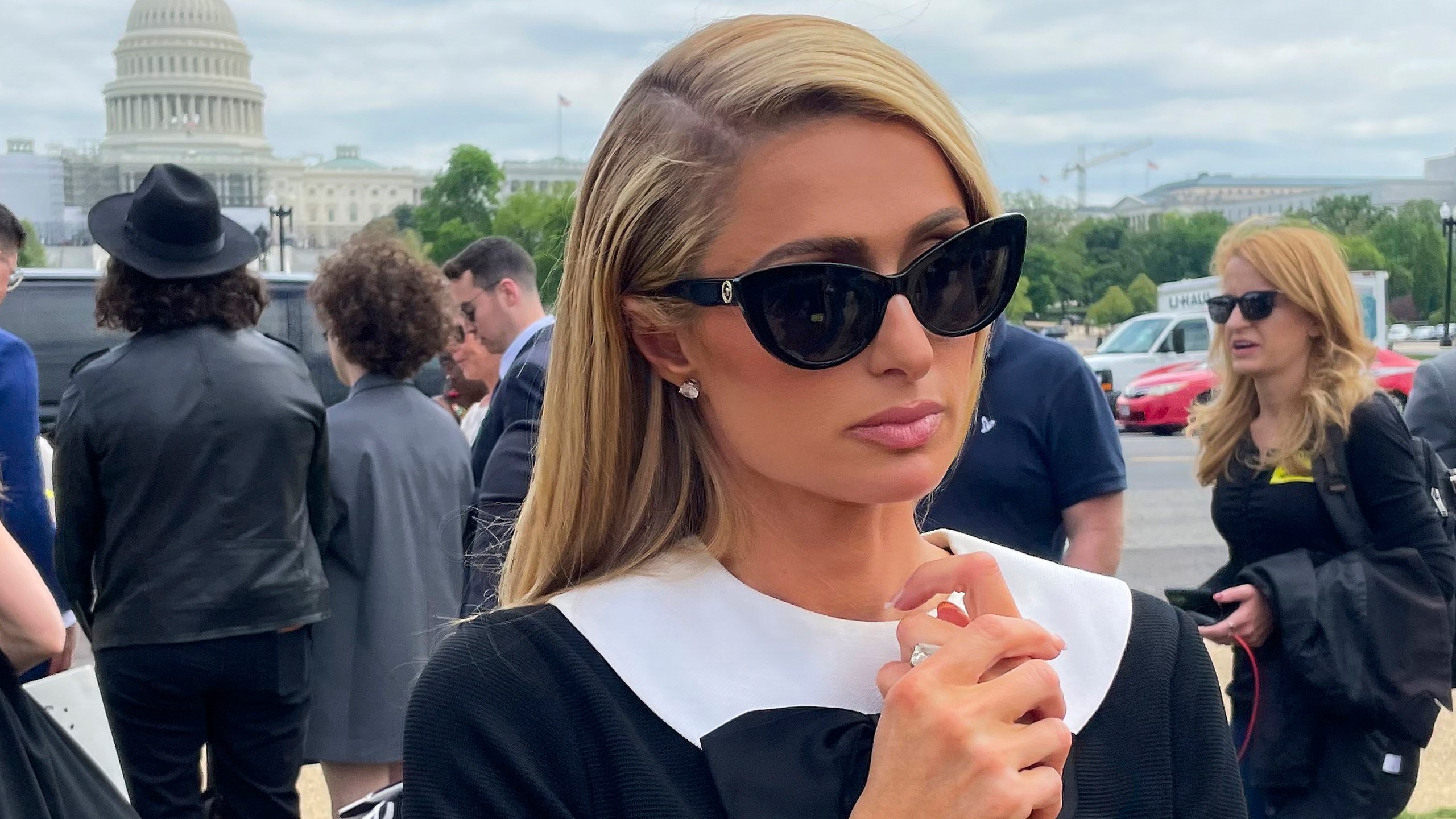 FILE - Paris Hilton meets with a supporters after speaking at a Stop Institutional Child Abuse, May 11, 2022 in Washington. The House has passed legislation requiring more oversight of youth residential treatment facilities. The vote Wednesday is a feat for hotel heiress Paris Hilton who has spent years lobbying lawmakers to regulate the industry. (AP Photo/Pablo Martinez Monsivais, File)