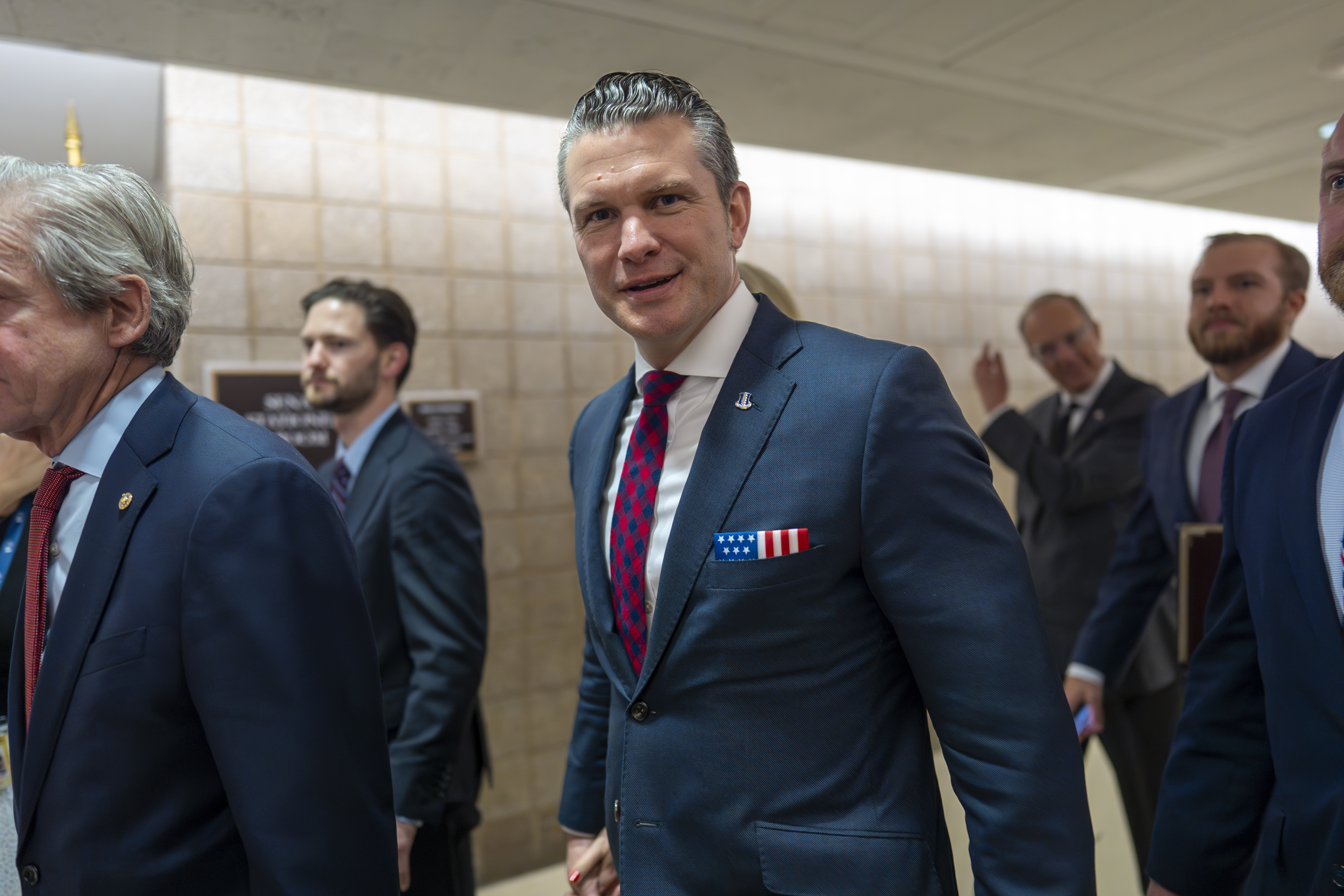 Pete Hegseth, President-elect Donald Trump's nominee to be Defense Secretary, walks to meet with senators, at the Capitol in Washington, Tuesday, Dec. 17, 2024. (AP Photo/J. Scott Applewhite)