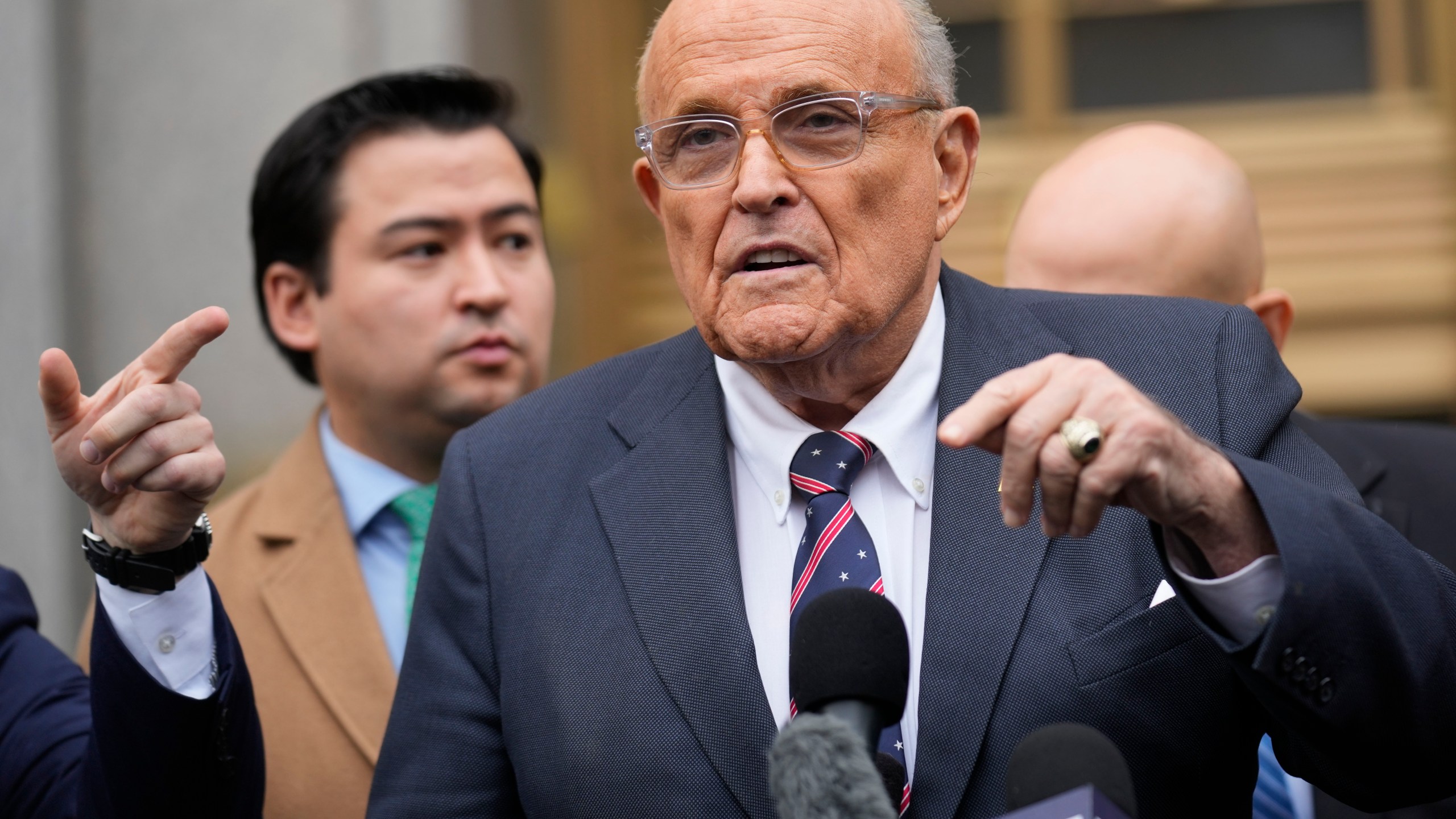 FILE - Rudy Giuliani speaks to reporters as he leaves the federal courthouse in New York, Nov. 26, 2024. (AP Photo/Seth Wenig, File)