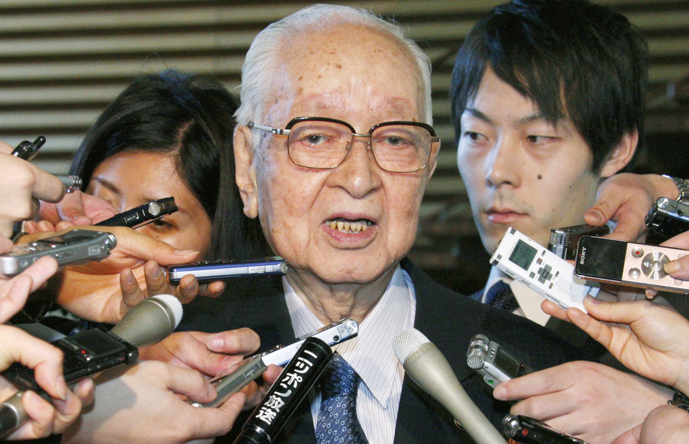 FILE - Japanese media mogul Tsuneo Watanabe, chairman of the Yomiuri Shimbun Holdings, speaks to reporters in Tokyo, on Jan. 17, 2014. (Kyodo News via AP, File)