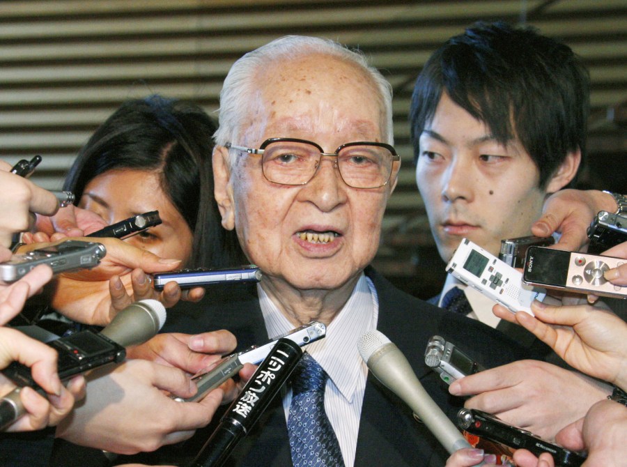 FILE - Japanese media mogul Tsuneo Watanabe, chairman of the Yomiuri Shimbun Holdings, speaks to reporters in Tokyo, on Jan. 17, 2014. (Kyodo News via AP, File)