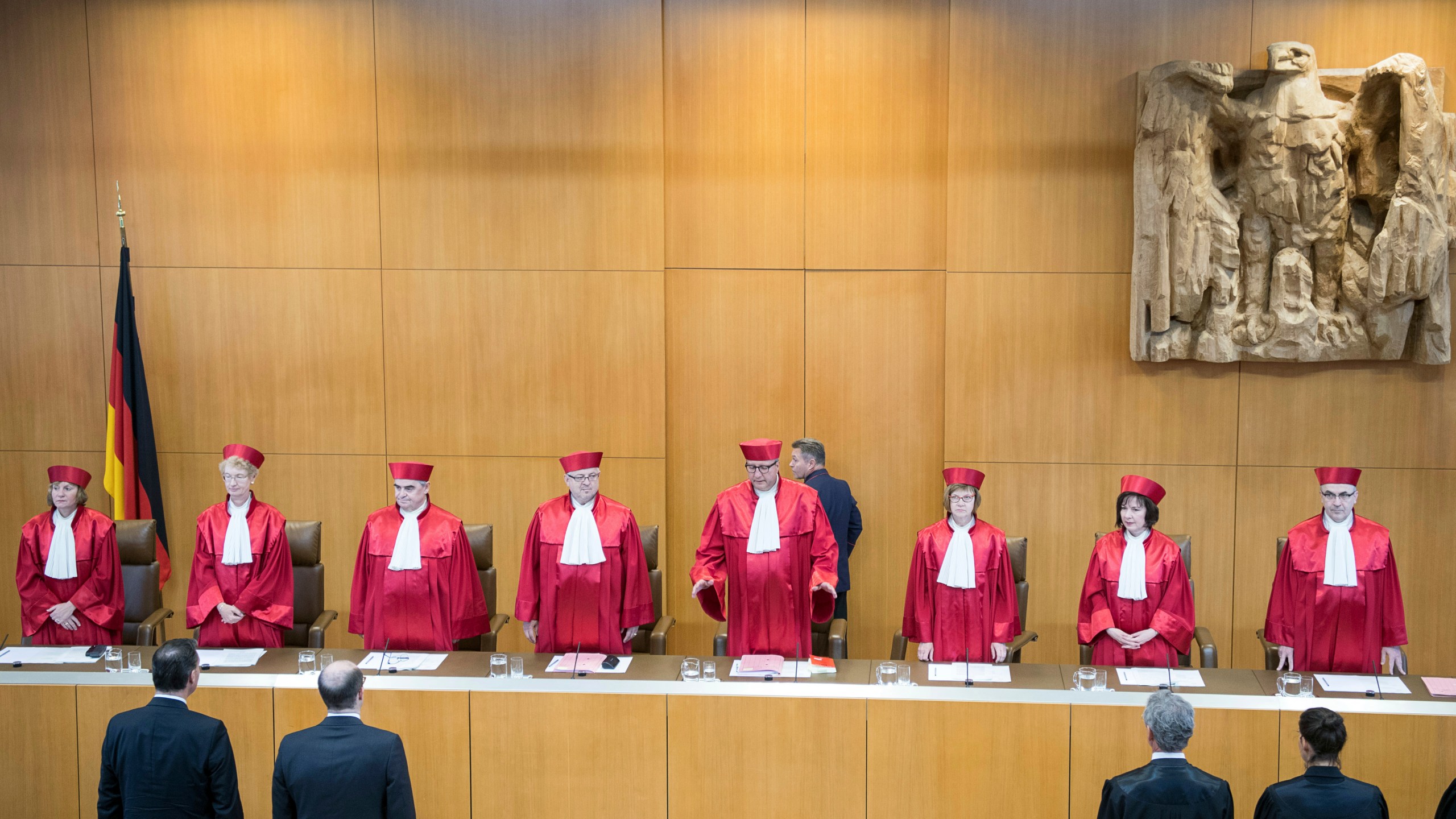 FILE - Andreas Vosskuhle, fourth from right, President of the German constitutional court announced the decision of Germany's highest court to upheld a ban on strikes by civil servants, in Karlsruhe, Germany, Tuesday, June 12, 2018. (AP Photo/Sebastian Gollnow, Pool, File)