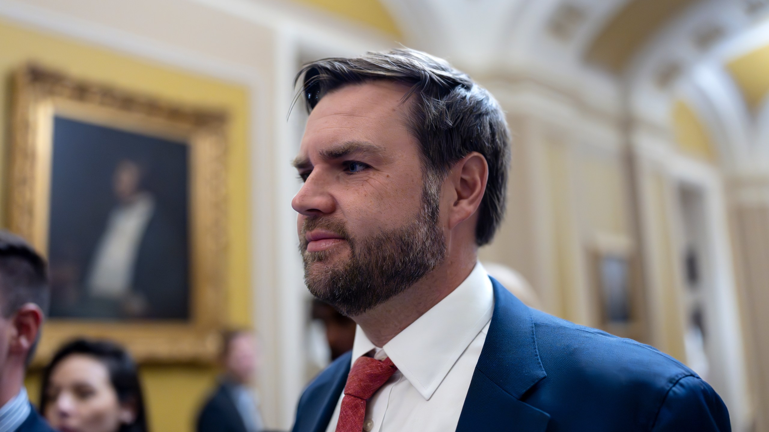 Sen. JD Vance, R-Ohio, the vice president-elect, leaves the Senate chamber as lawmakers work on an interim spending bill to avoid a shutdown of federal agencies, at the Capitol in Washington, Wednesday, Dec. 18, 2024. (AP Photo/J. Scott Applewhite)