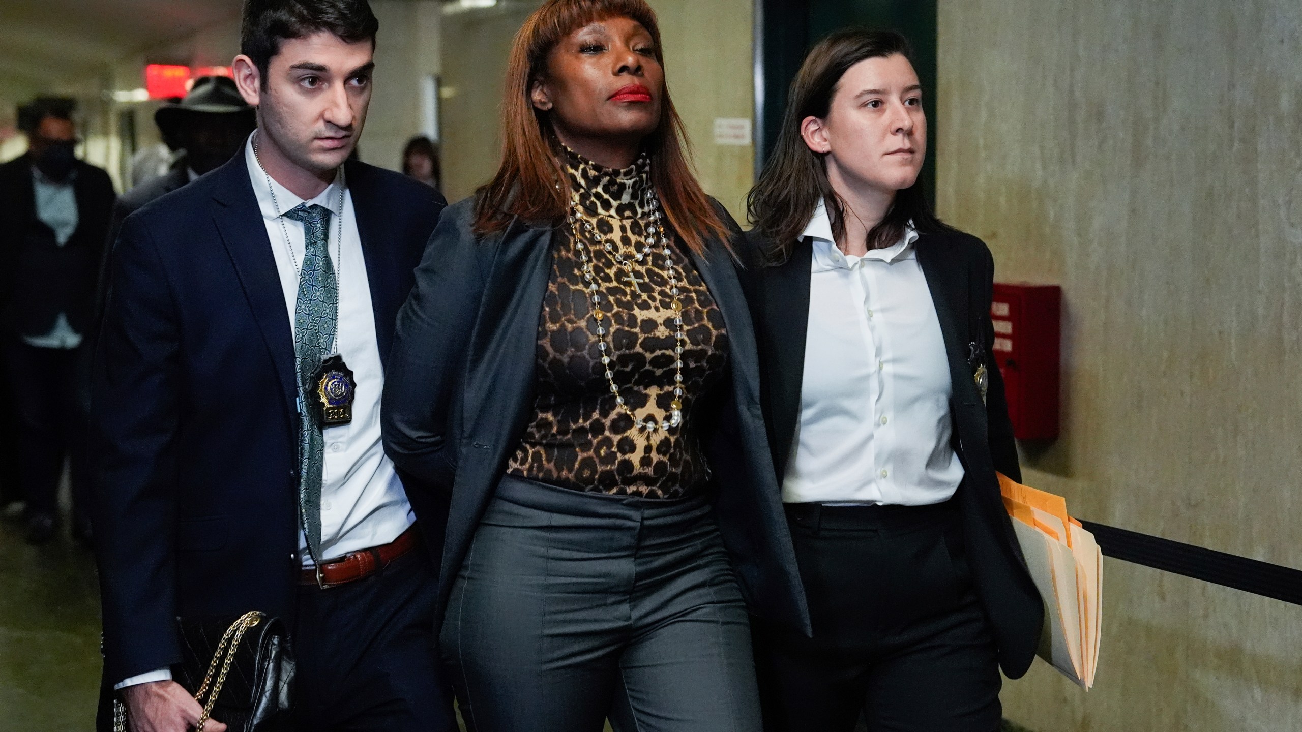 Ingrid Lewis-Martin is escorted into Manhattan criminal court, Thursday, Dec. 19, 2024, in New York. (AP Photo/Julia Demaree Nikhinson)