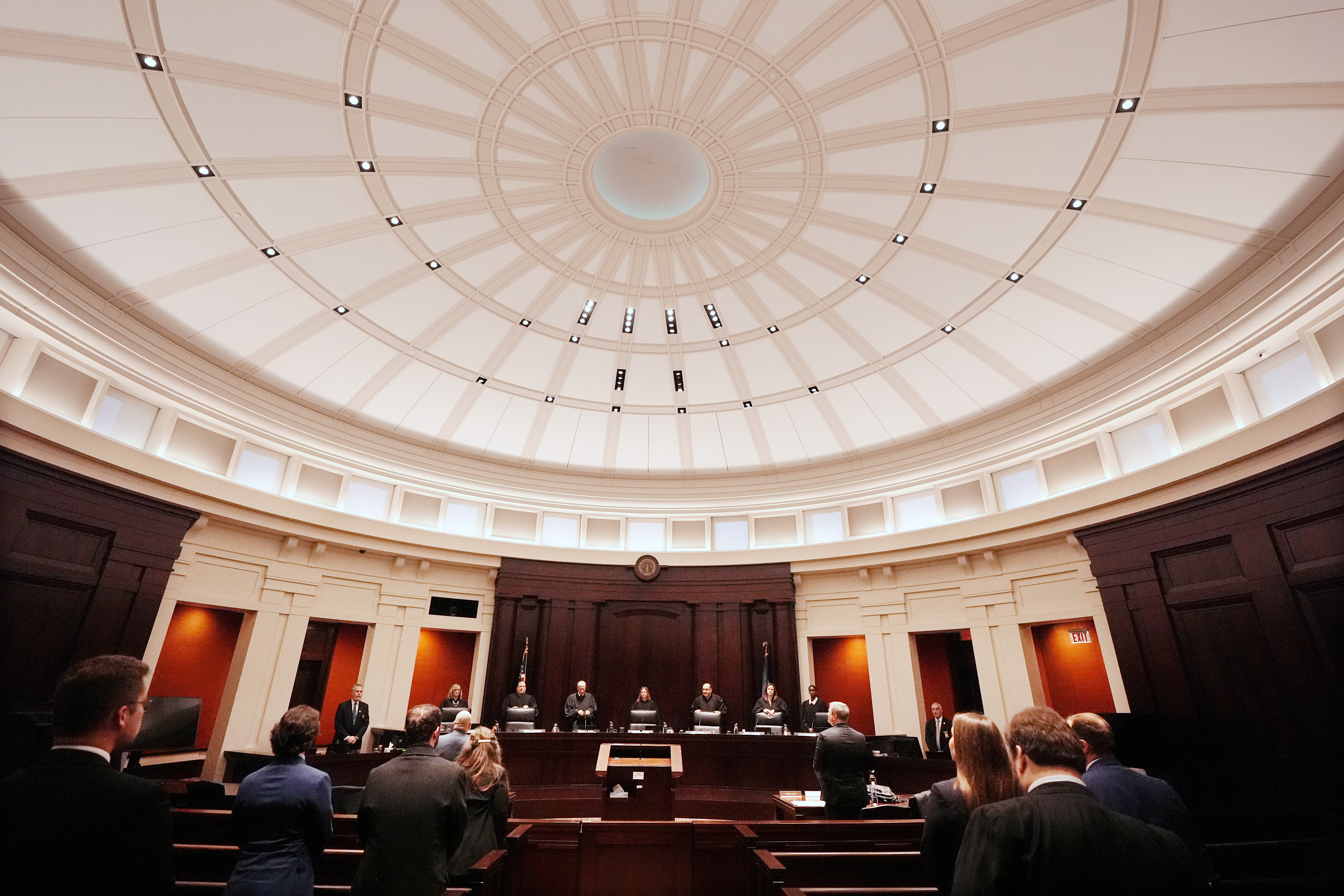 Justices of the Michigan Supreme Court enter their court at the Michigan Hall of Justice, Wednesday, Dec. 4, 2024, in Lansing, Mich. (AP Photo/Carlos Osorio)