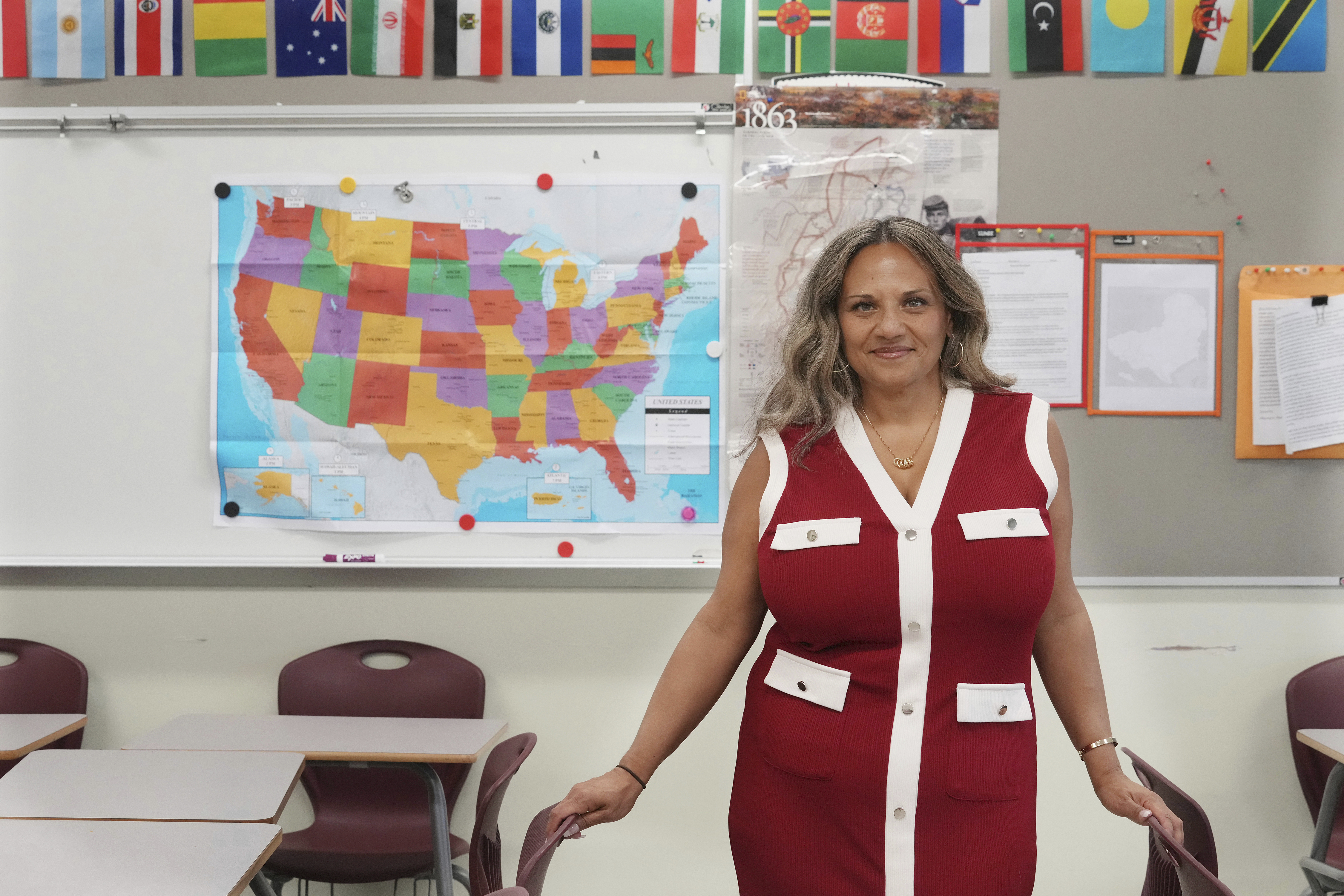 Renee O'Connor stands in one of the classrooms where she teaches Black history at Miami Norland Senior High School, Thursday, Dec. 19, 2024, in Miami Gardens, Fla. (AP Photo/Marta Lavandier)