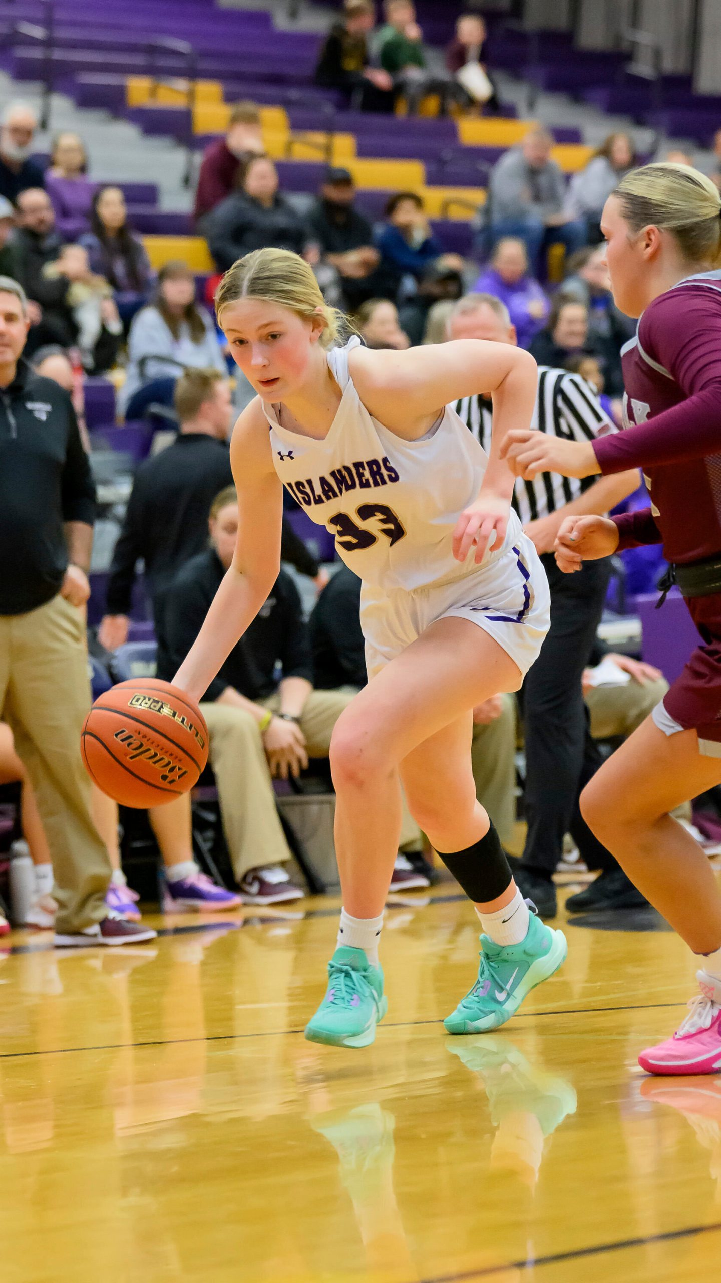 Grand Island High School's Emmy Ward dribbles during a girls high school basketball game against Norfolk High School, Jan. 26, 2024 in Grand Island, Neb. (Jimmy Rash via AP)