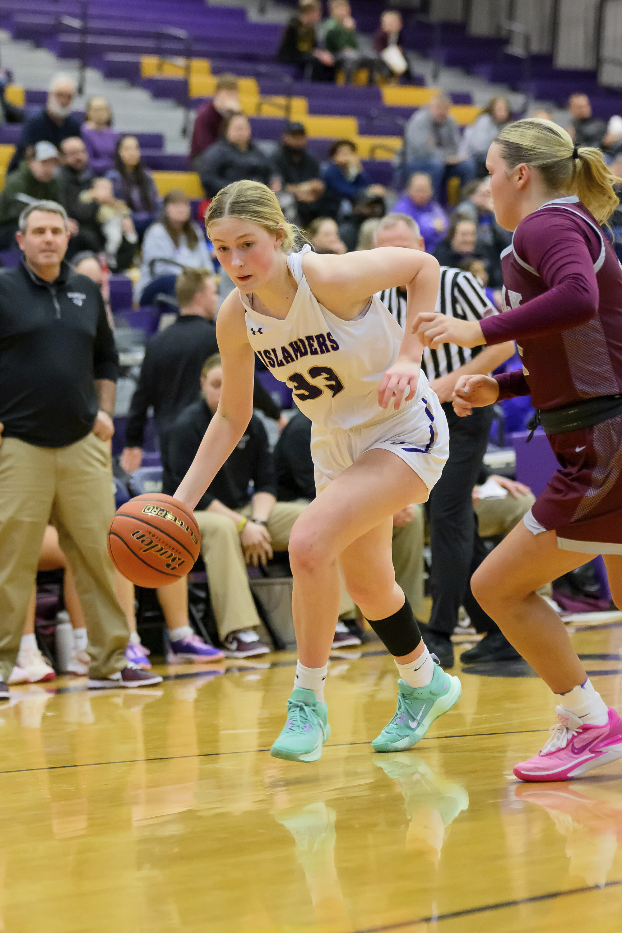 Grand Island High School's Emmy Ward dribbles during a girls high school basketball game against Norfolk High School, Jan. 26, 2024 in Grand Island, Neb. (Jimmy Rash via AP)