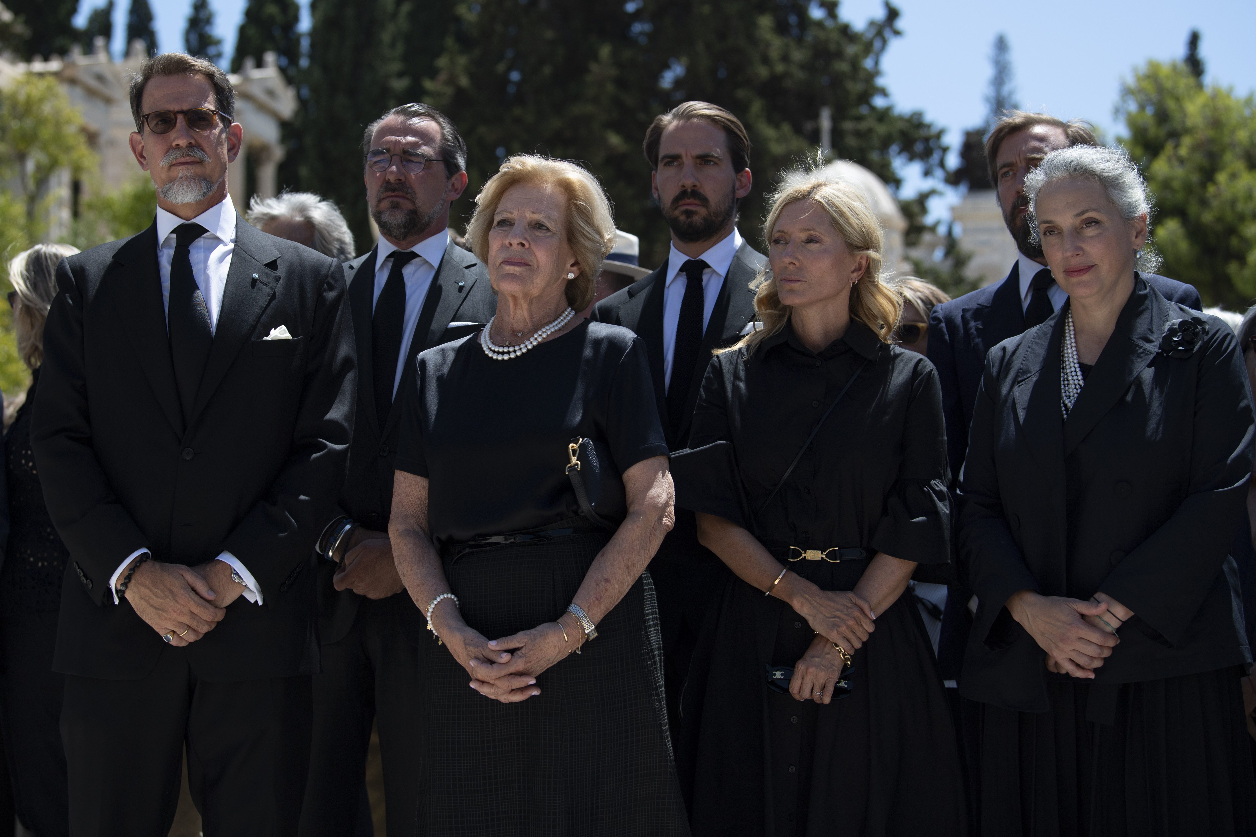 FILE - From left, Pavlos, son of former king of Greece Constantine II, Nikolaos, son of former king of Greece Constantine II, former Queen Anne-Marie of Greece, Philippos son of former king of Greece Constantine II, Marie-Chantal, wife of Pavlos, and Olga, daughter of Michael, attend the funeral of Michael, cousin of the late Prince Philip, Duke of Edinburgh, in Athens, Greece, Thursday, Aug. 1, 2024. (AP Photo/Michael Varaklas, File)