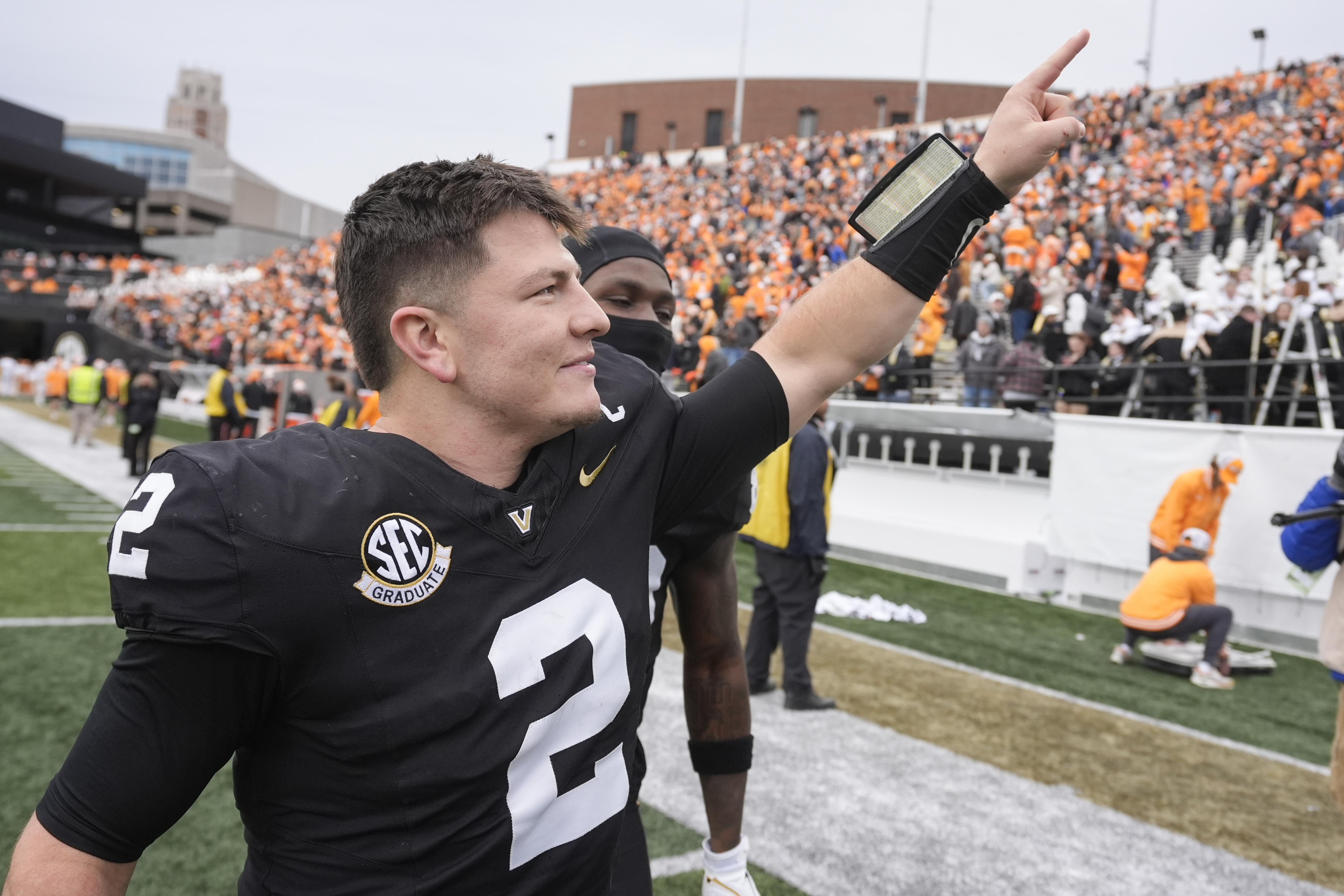 Vanderbilt quarterback Diego Pavia (2) waves to fans as he leaves the field after an NCAA college football game against Tennessee Saturday, Nov. 30, 2024, in Nashville, Tenn. Tennessee won 36-23. (AP Photo/George Walker IV)