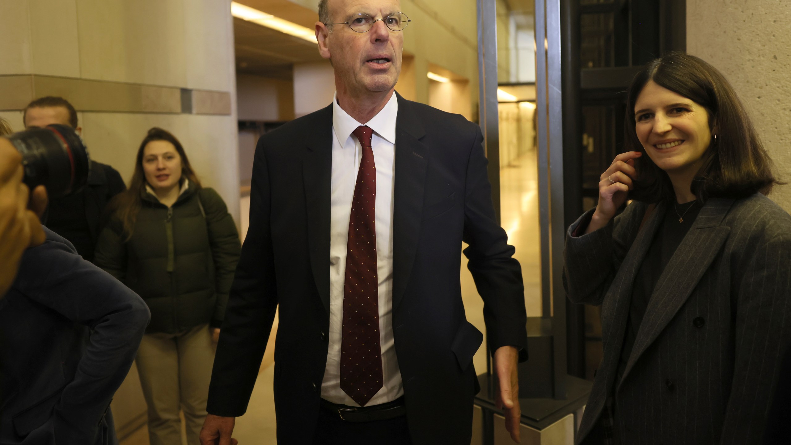 Newly named finance minister Eric Lombard leaves after the handover ceremony Monday, Dec. 23, 2024 in Paris. (AP Photo/Thomas Padilla)