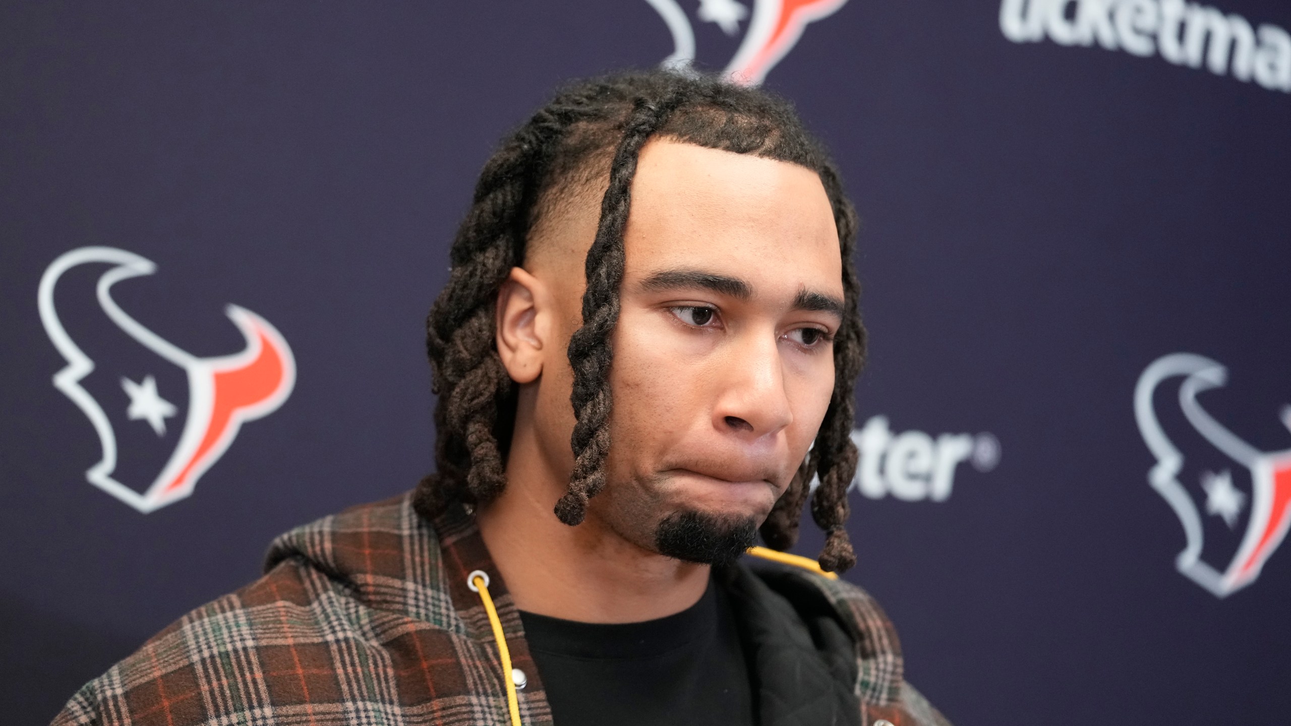 Houston Texans quarterback C.J. Stroud speaks during a news conference following an NFL football game against the Kansas City Chiefs Saturday, Dec. 21, 2024, in Kansas City, Mo. The Chiefs won 27-19. (AP Photo/Ed Zurga)