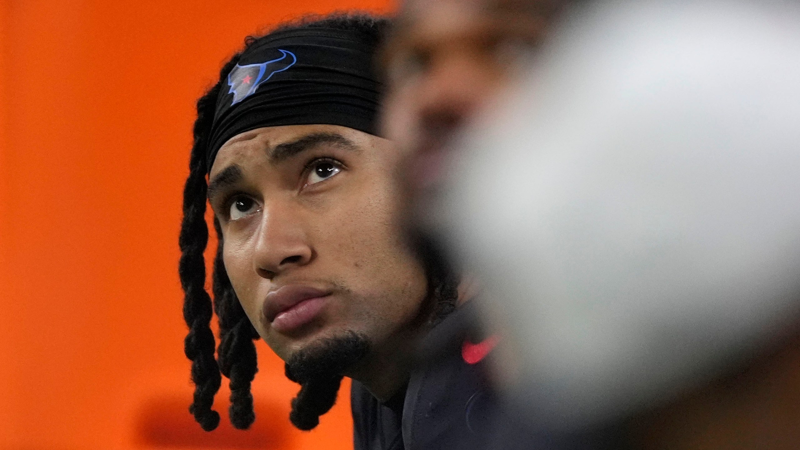 Houston Texans quarterback C.J. Stroud sits on the bench during the second half of an NFL football game against the Baltimore Ravens, Wednesday, Dec. 25, 2024, in Houston. (AP Photo/Eric Christian Smith)