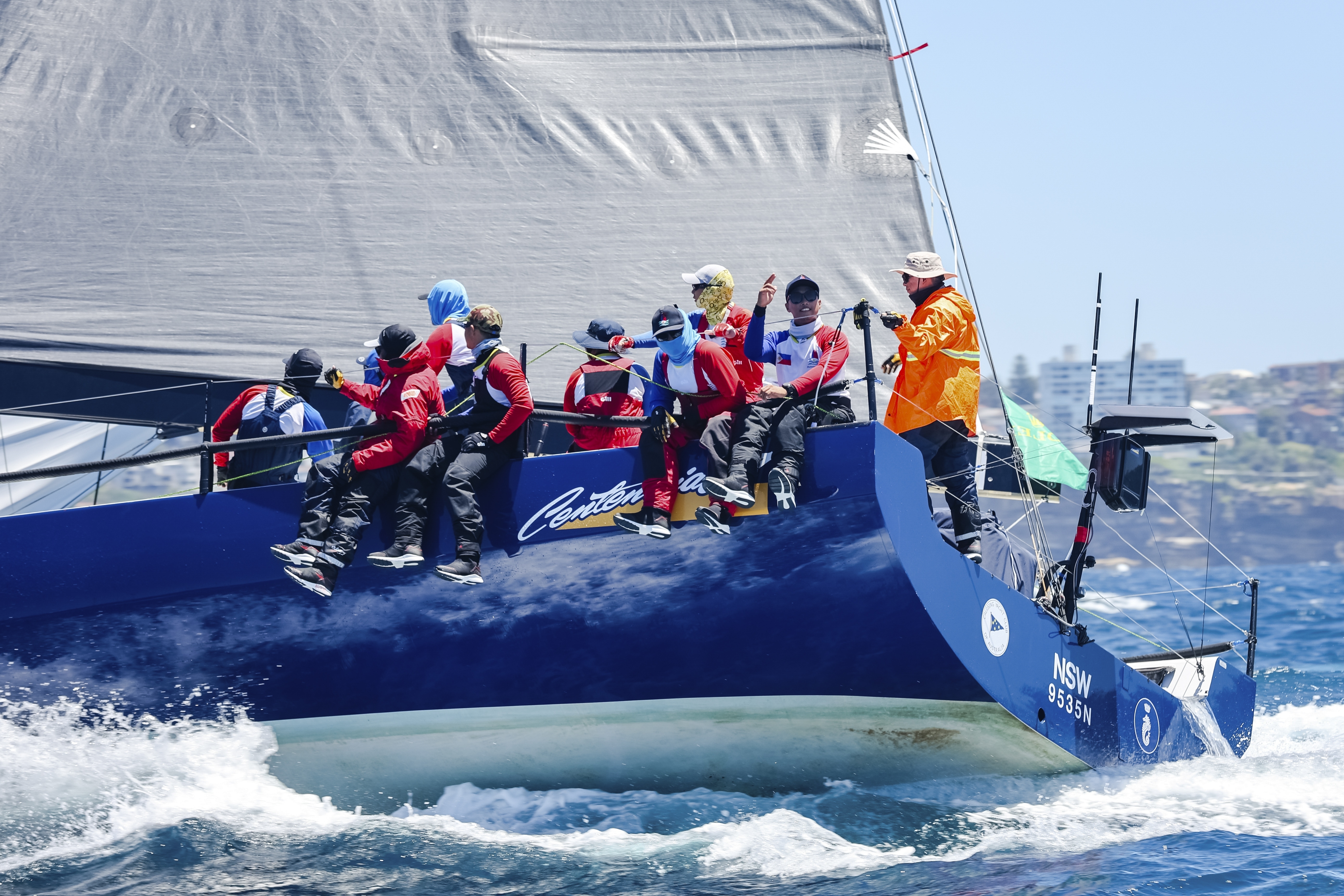 In this photo provided by Salty Dingo, Philippines entry Centennial sails towards the heads after the start of the Sydney to Hobart yacht race in Sydney, Thursday, Dec. 26, 2024. (Salty Dingo via AP)