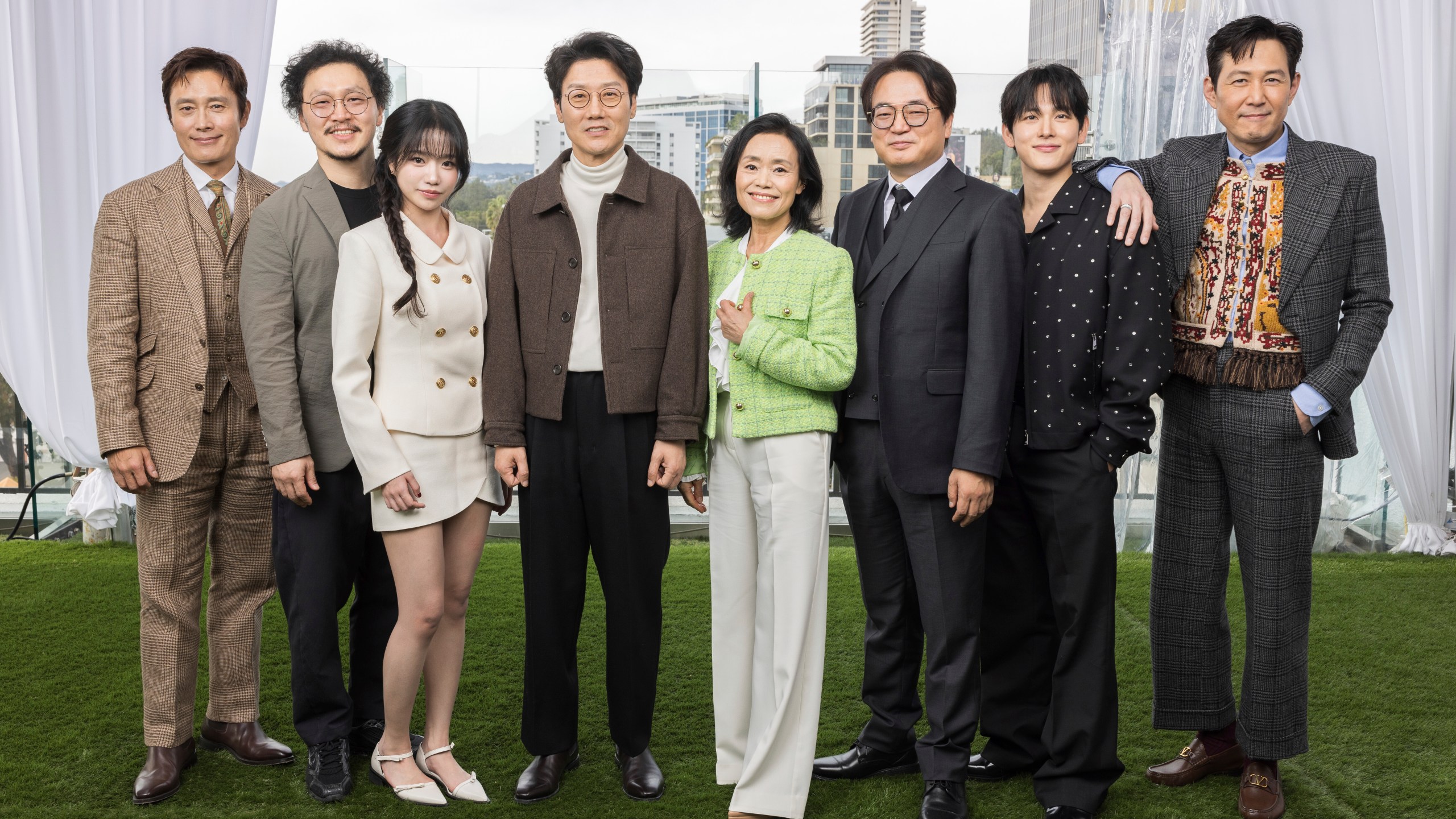 Lee Byung-hun, from left, Yang Dong-geun, Jo Yu-ri, Hwang Dong-hyuk, Kang Ae-sim, Lee Seo-hwan, Im Si-wan and Lee Jung-jae pose for a portrait to promote the second season of "Squid Game" on Wednesday, Dec. 11, 2024, in Los Angeles. (Photo by Willy Sanjuan/Invision/AP)