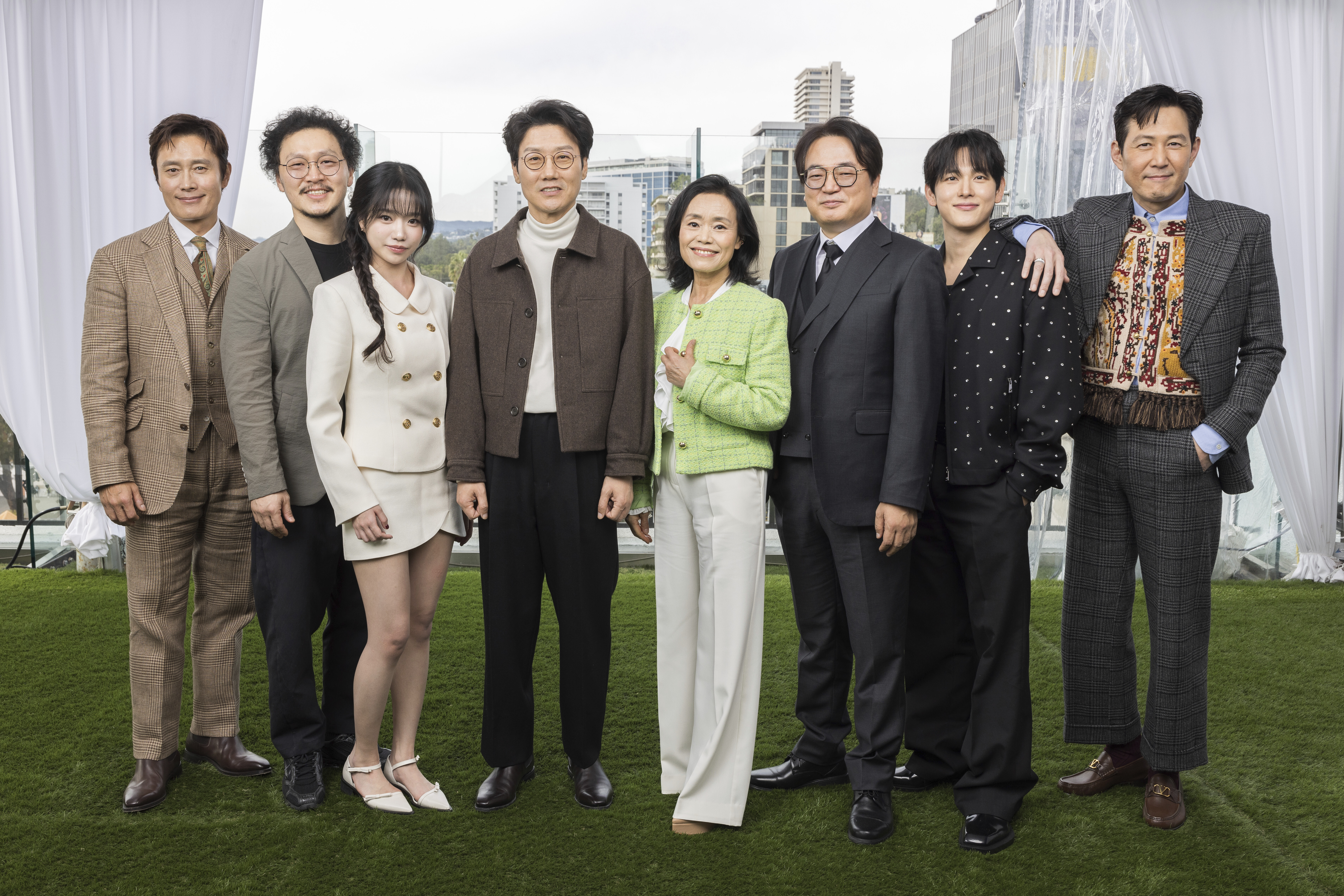 Lee Byung-hun, from left, Yang Dong-geun, Jo Yu-ri, Hwang Dong-hyuk, Kang Ae-sim, Lee Seo-hwan, Im Si-wan and Lee Jung-jae pose for a portrait to promote the second season of "Squid Game" on Wednesday, Dec. 11, 2024, in Los Angeles. (Photo by Willy Sanjuan/Invision/AP)