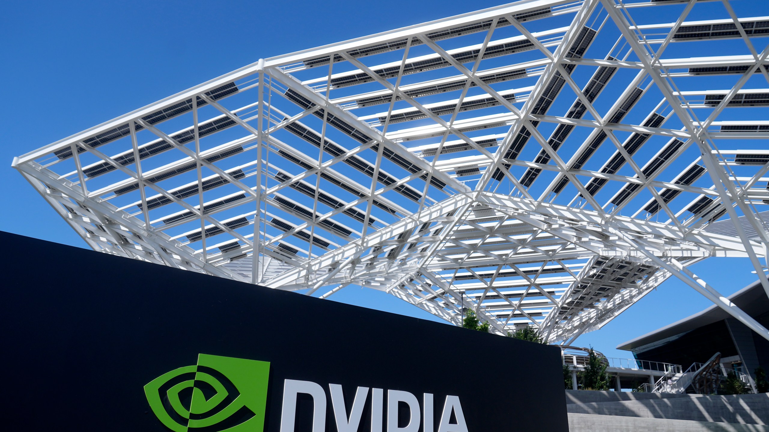 FILE - A sign for a Nvidia office building is shown in Santa Clara, Calif., on Aug. 7, 2024. (AP Photo/Jeff Chiu, File)