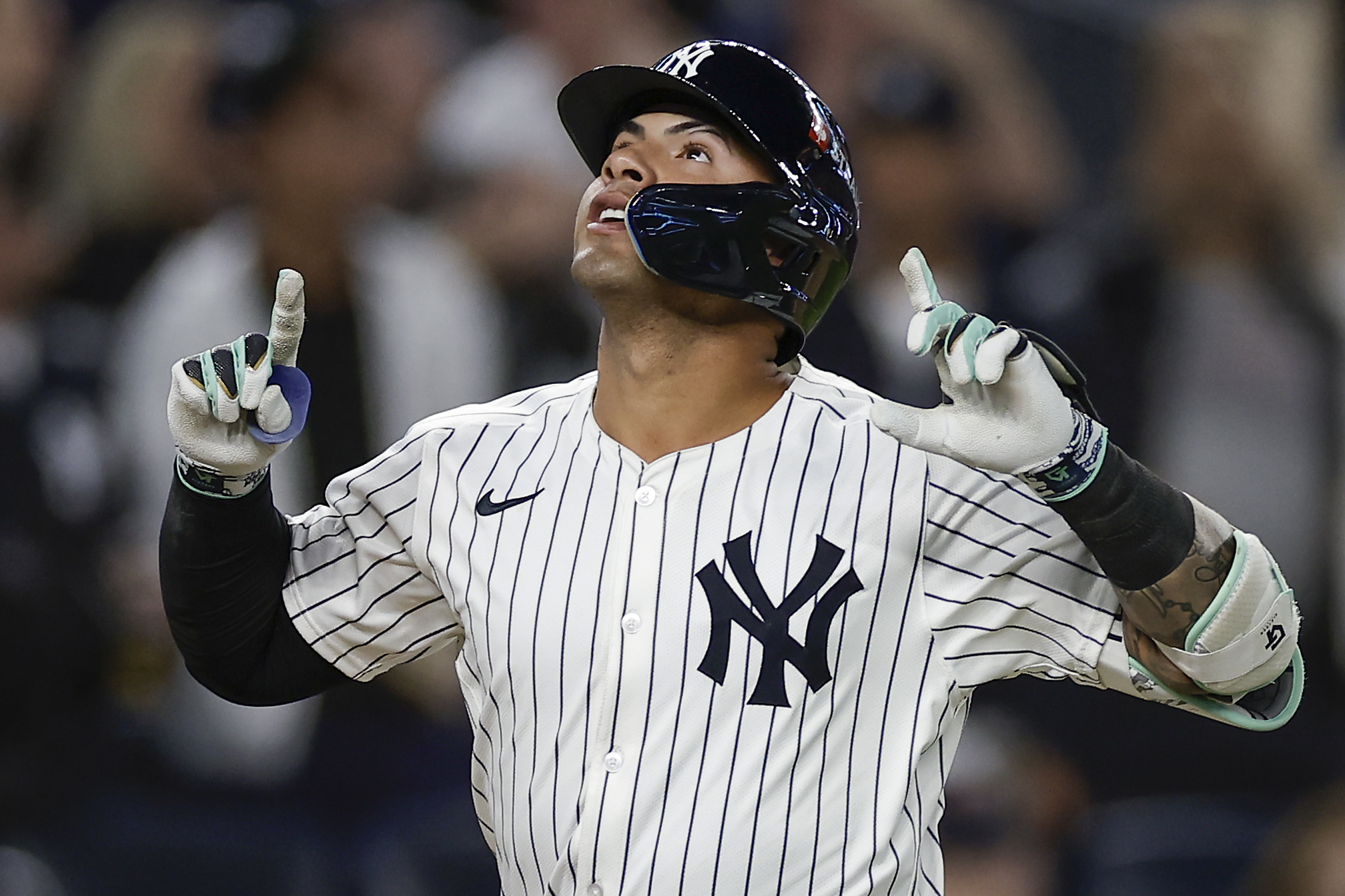 FILE - New York Yankees' Gleyber Torres reacts after hitting a two-run home run against the Kansas City Royals during the third inning Game 1 of the American League baseball division series, Saturday, Oct. 5, 2024, in New York. (AP Photo/Adam Hunger, File)