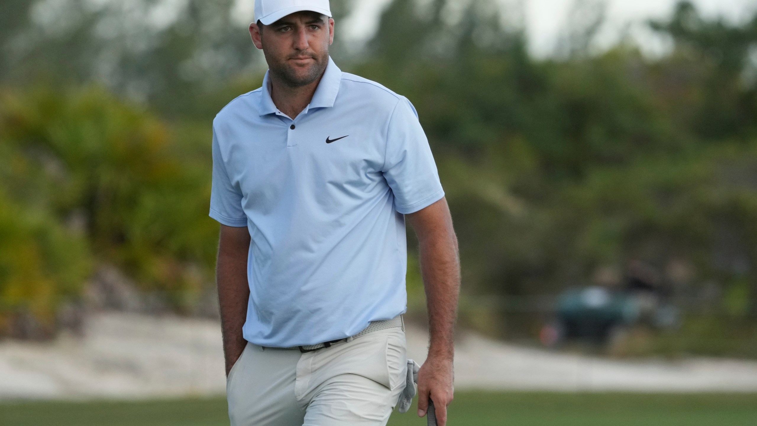 Scottie Scheffler, of the United States, reacts after missing a putt on the 18th hole during the third round of the Hero World Challenge PGA Tour at the Albany Golf Club, in New Providence, Bahamas, Saturday, Dec. 7, 2024. (AP Photo/Fernando Llano)