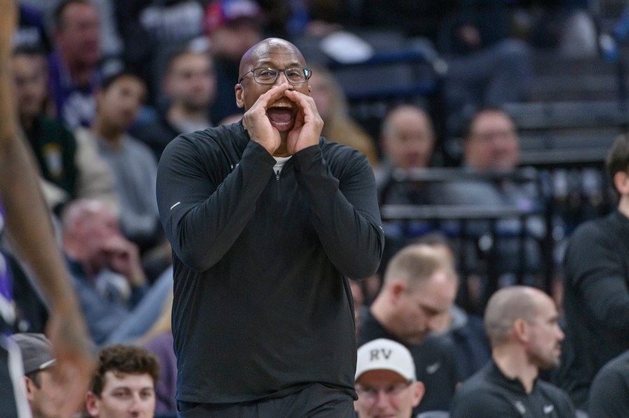 Sacramento Kings head coach Mike Brown shouts instructions from the bench during the second half of an NBA basketball game against the Denver Nuggets in Sacramento, Calif., Monday, Dec. 16, 2024. The Nuggets won 130-129. (AP Photo/Randall Benton)