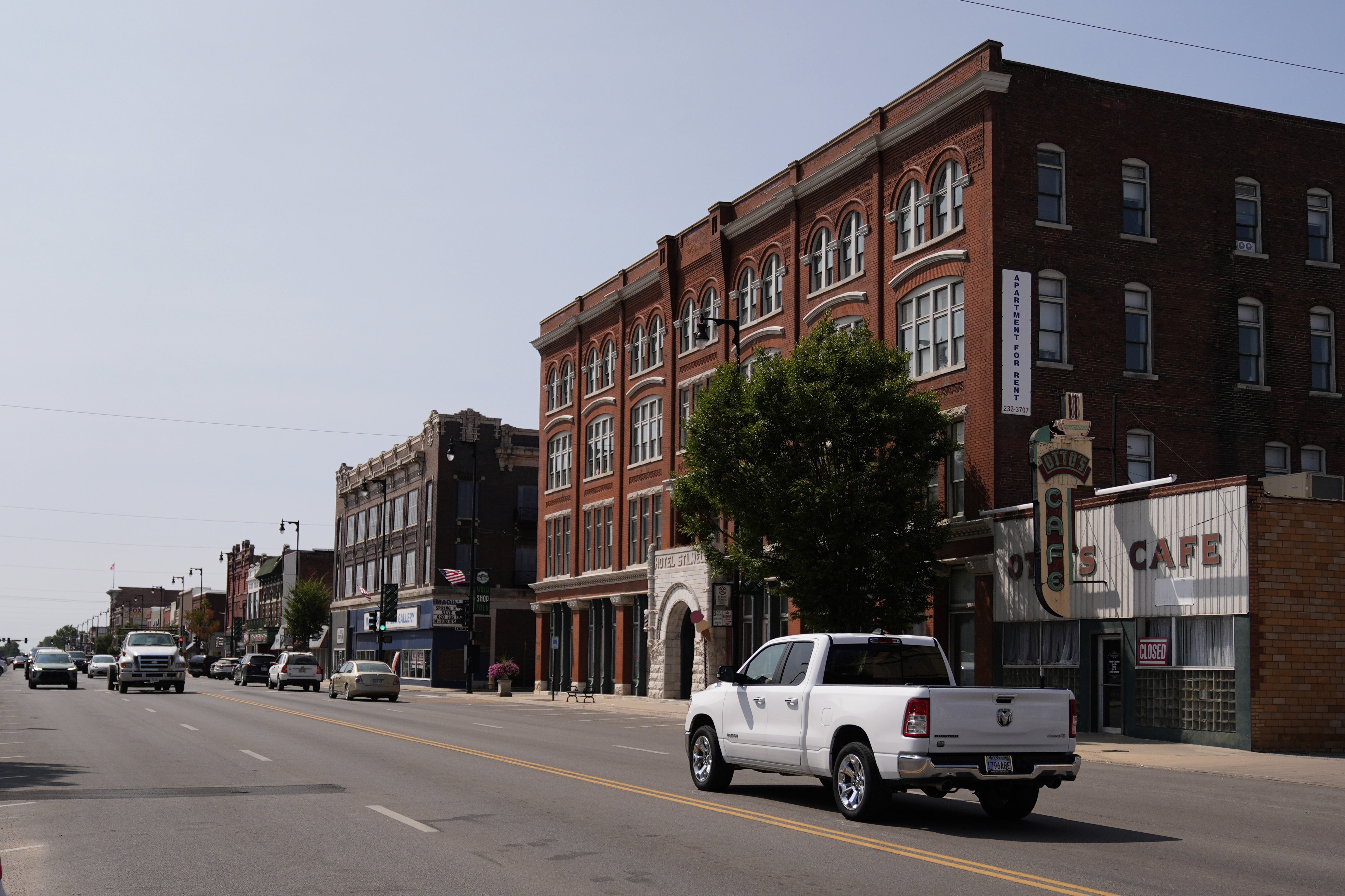 FILE - People drive through downtown Pittsburg, Kan., Tuesday, Sept. 10, 2024, that is home to a new Planned Parenthood clinic serving patients from Kansas as well as nearby Missouri, Oklahoma, Arkansas, Texas, and other states where abortions have become illegal or hard to get. (AP Photo/Charlie Riedel, File)