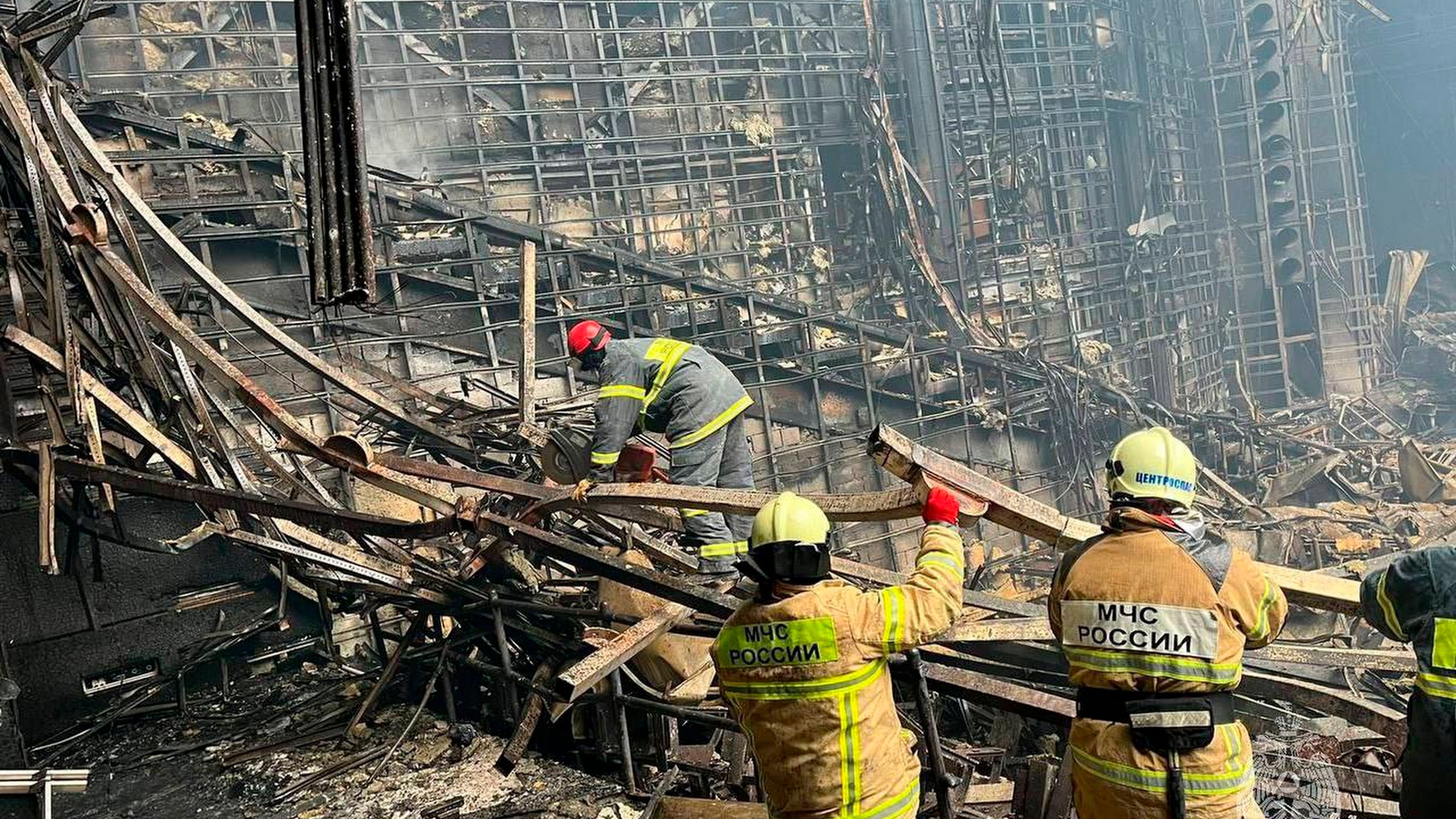 FILE - In this photo released by the Russian Emergency Ministry Press Service, rescuers work at Crocus City Hall on the western edge of Moscow, on March 23, 2024, following an attack. (Russian Emergency Ministry Press Service via AP, File)