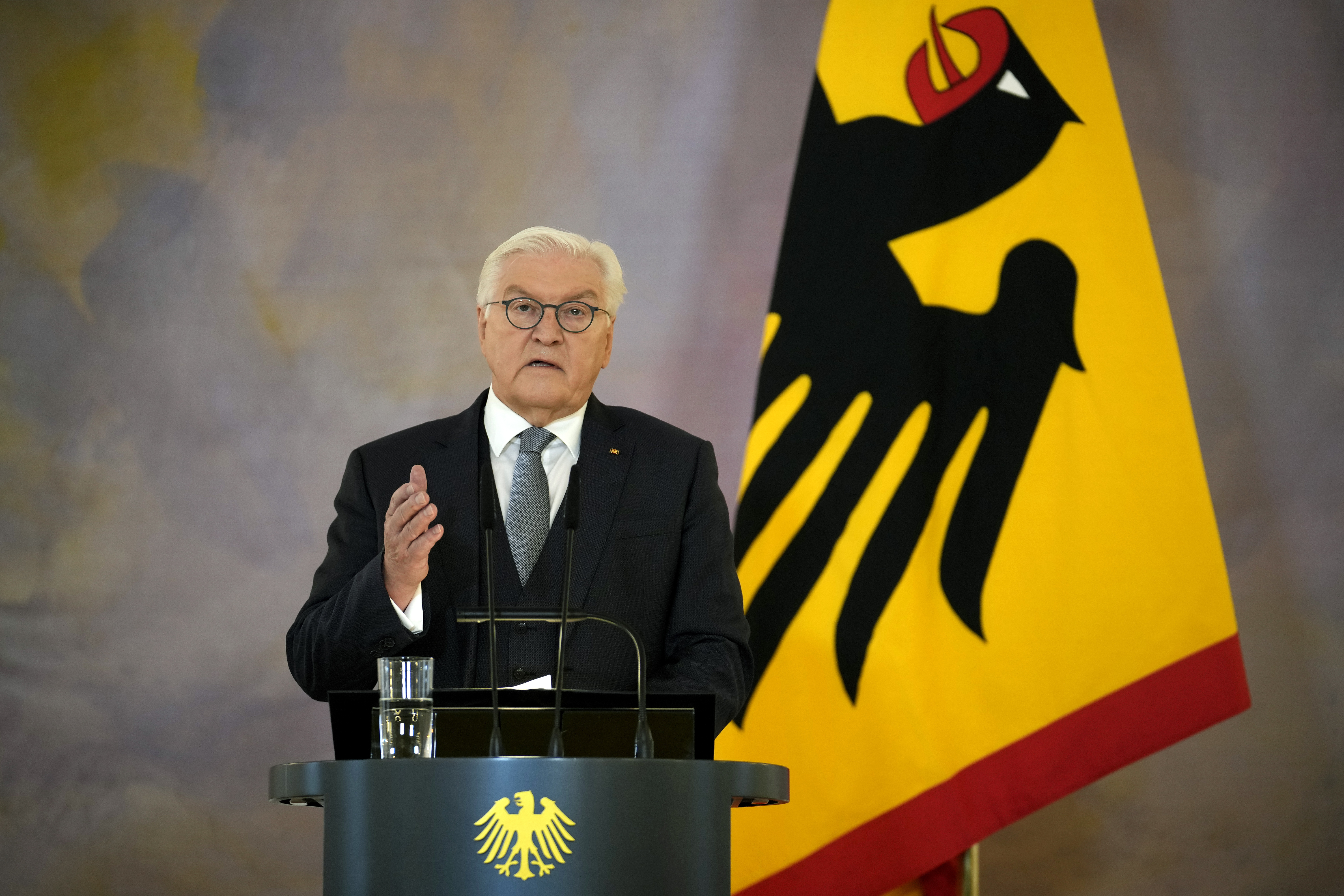 German President Frank-Walter Steinmeier announces the decision to dissolve the German Bundestag and schedule a new election for February 23 next year, in Berlin, Friday, Dec. 27, 2024. (AP Photo/Ebrahim Noroozi)