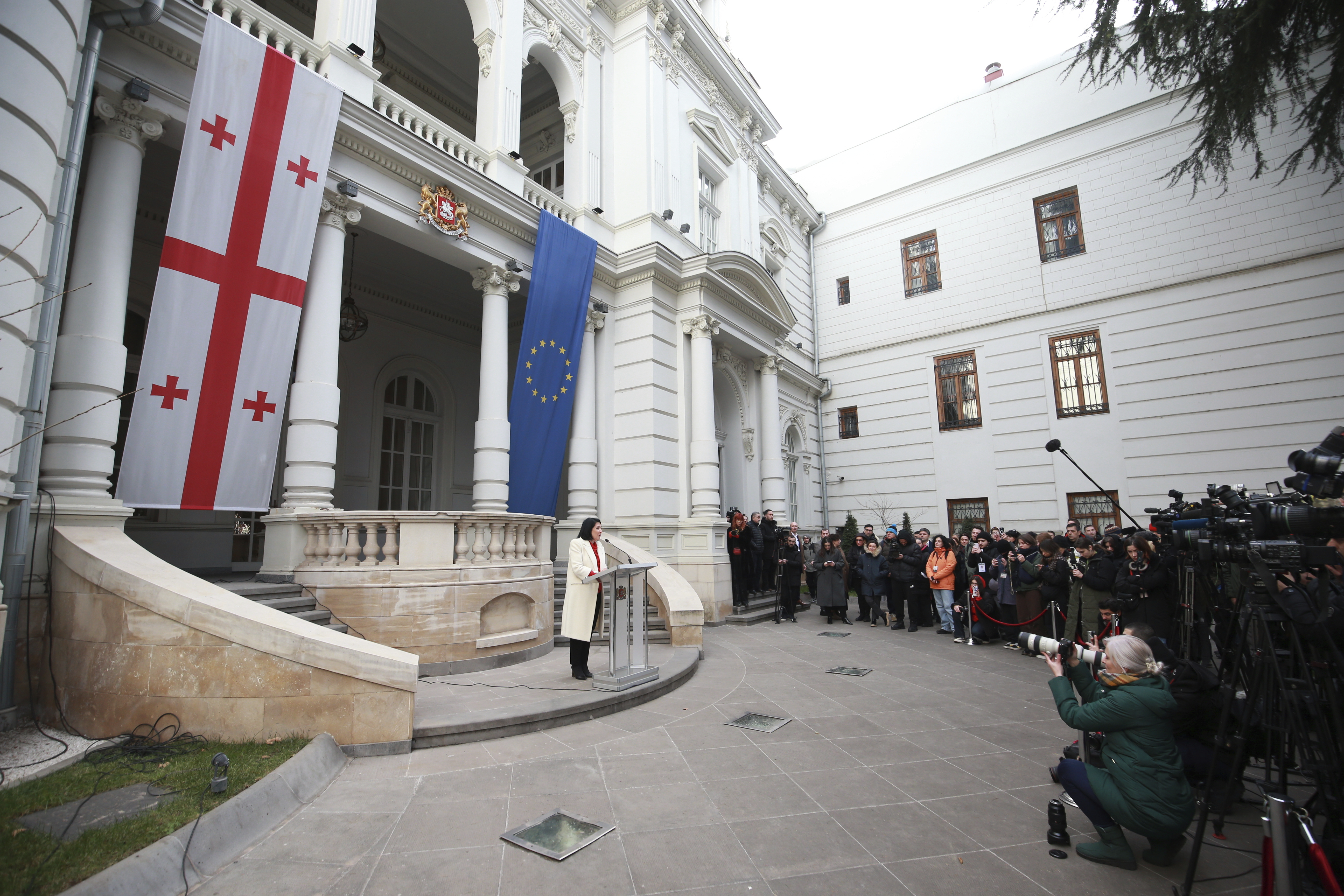 Outgoing Georgian President Salome Zourabichvili holds a press conference outside the Orbeliani Palace, the official residence of the President of Georgia, in Tbilisi, Georgia, Sunday, Dec. 29, 2024. (AP Photo/Zurab Tsertsvadze)