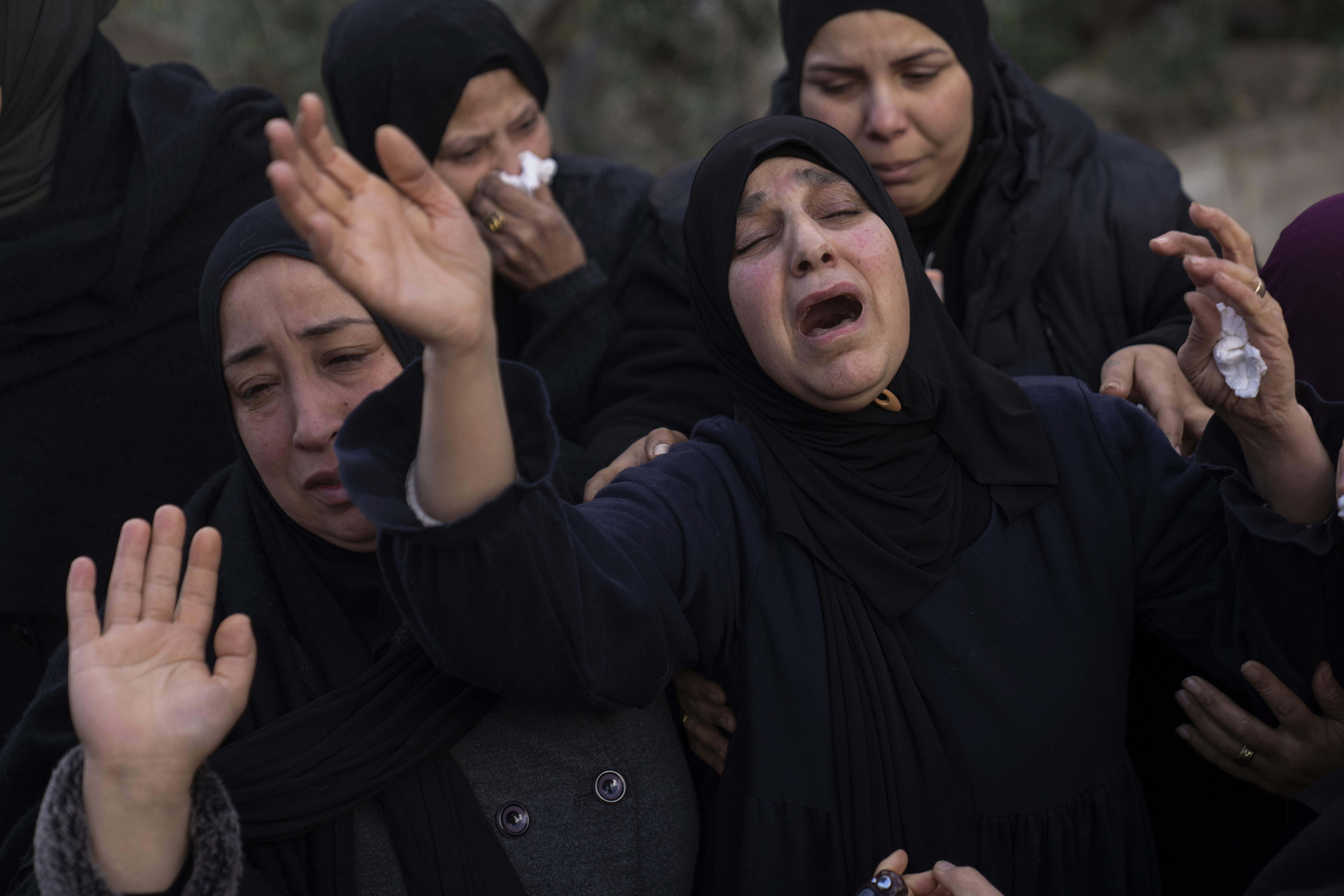 Relatives mourn the death of Palestinian Shatha al-Sabbagh, a 22-year-old journalism student, during her funeral in the Jenin refugee camp in the Israeli-occupied West Bank, Sunday, Dec. 29, 2024. (AP Photo/Majdi Mohammed)