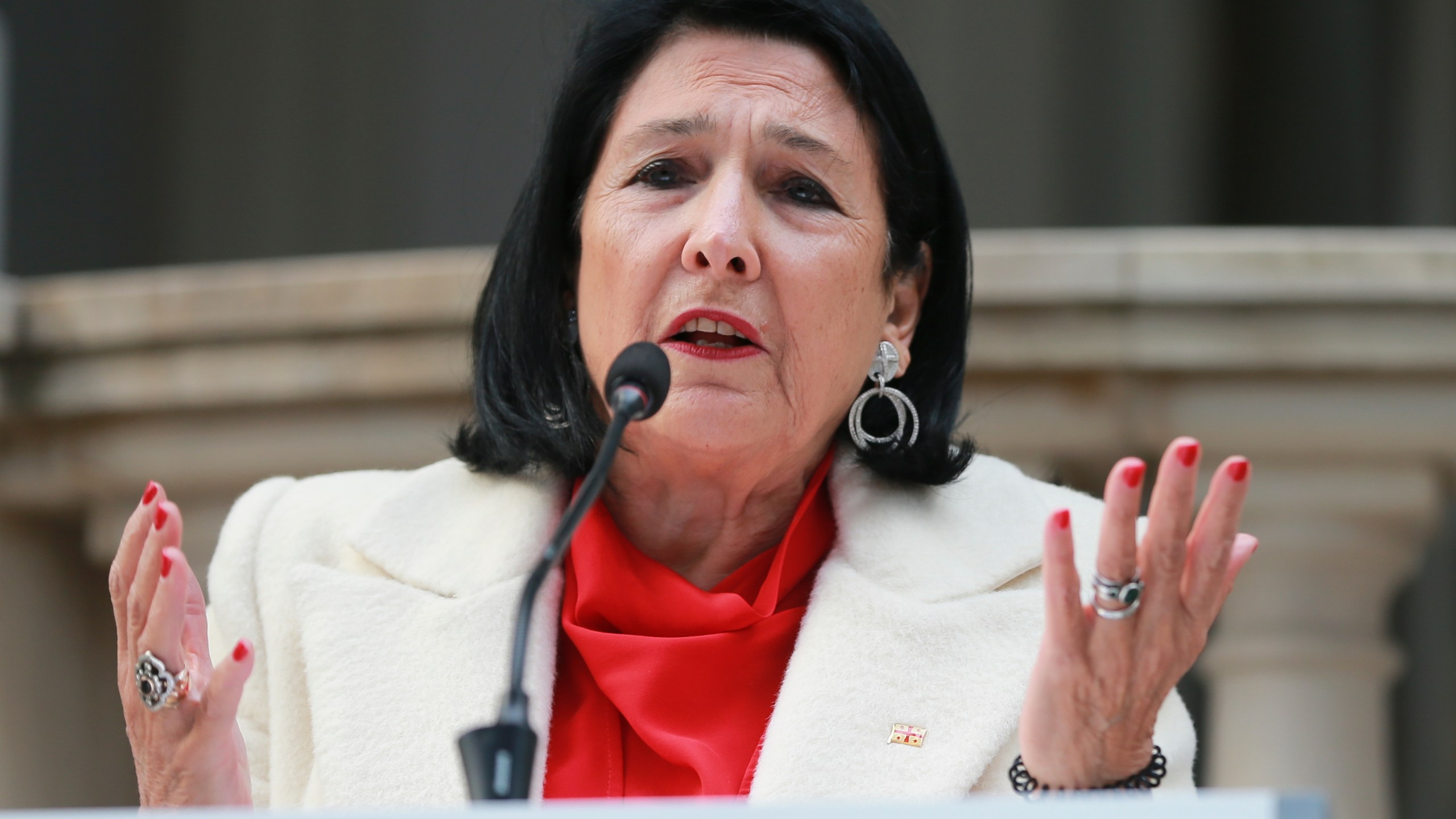 Outgoing Georgian President Salome Zourabichvili holds a press conference outside the Orbeliani Palace, the official residence of the President of Georgia, in Tbilisi, Georgia, Sunday, Dec. 29, 2024. (AP Photo/Zurab Tsertsvadze)