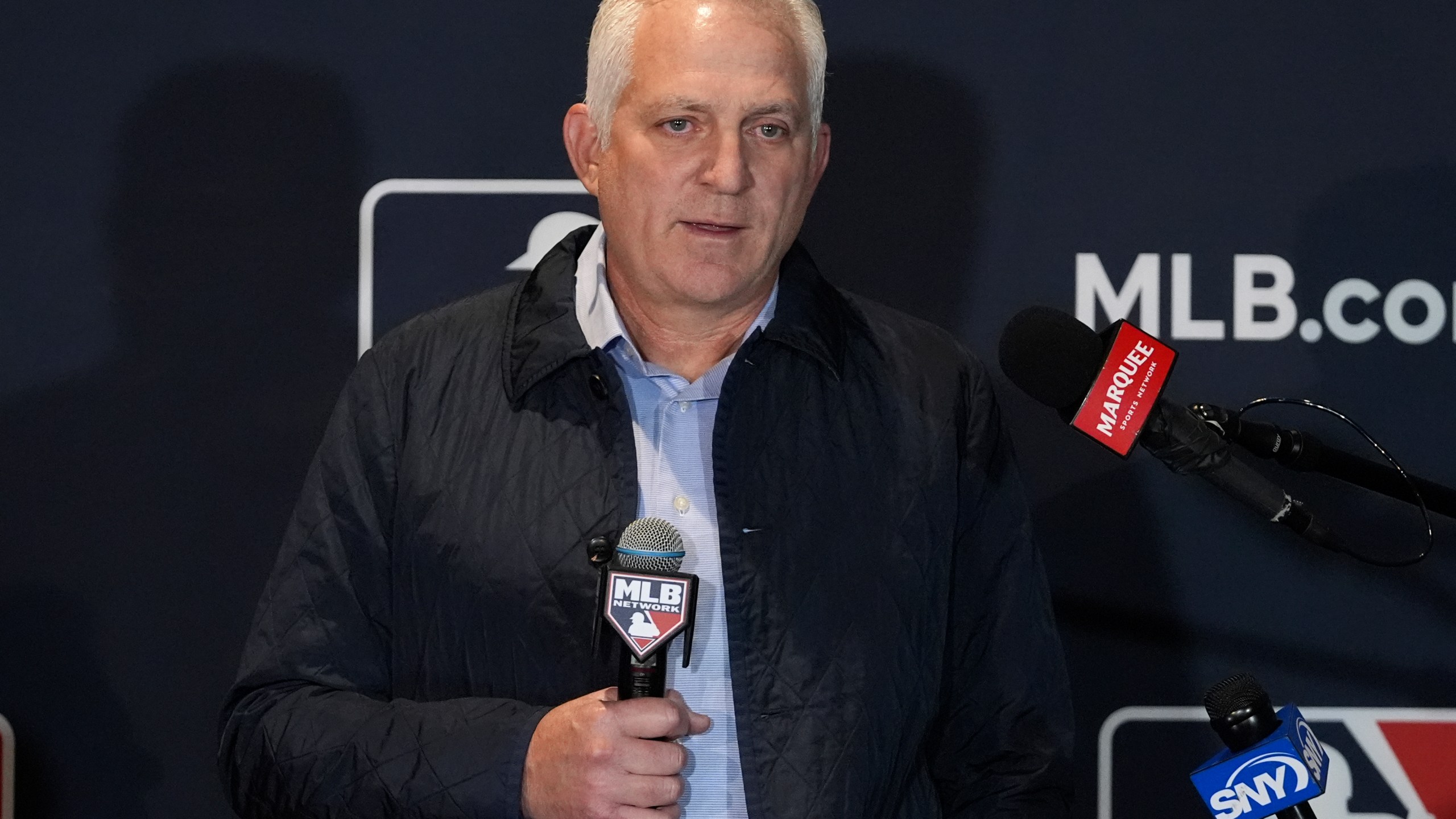 Joel Wolfe, agent for Japanese player Roki Sasaki, speaks to reporters at the Major League Baseball winter meetings in Dallas, Tuesday, Dec. 10, 2024. (AP Photo/Tony Gutierrez)