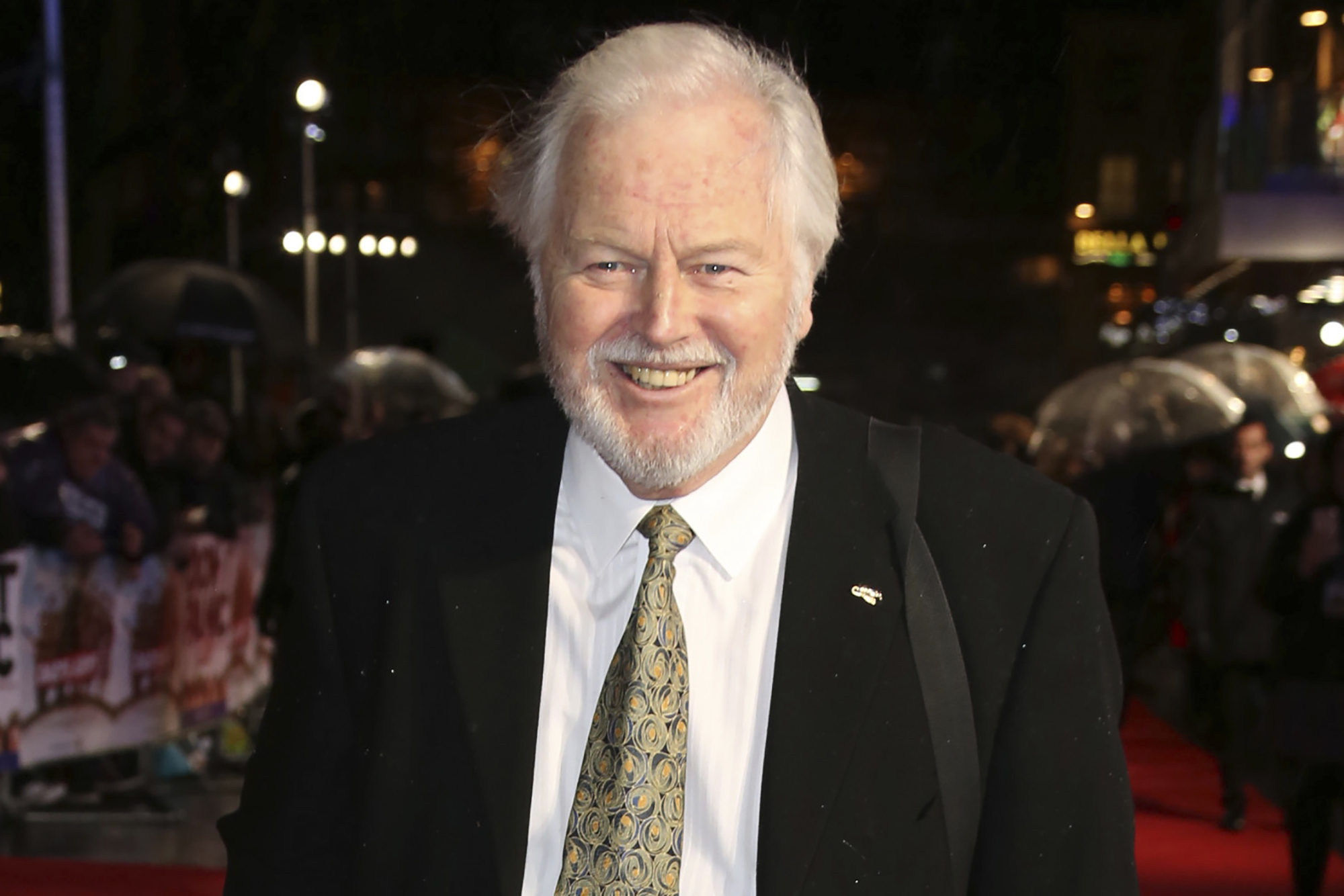 FILE - Actor Ian Lavender poses for photographers upon arrival at the World premiere of the film 'Dad's Army' at a central London cinema, Jan. 26, 2016. (Photo by Joel Ryan/Invision/AP, File)