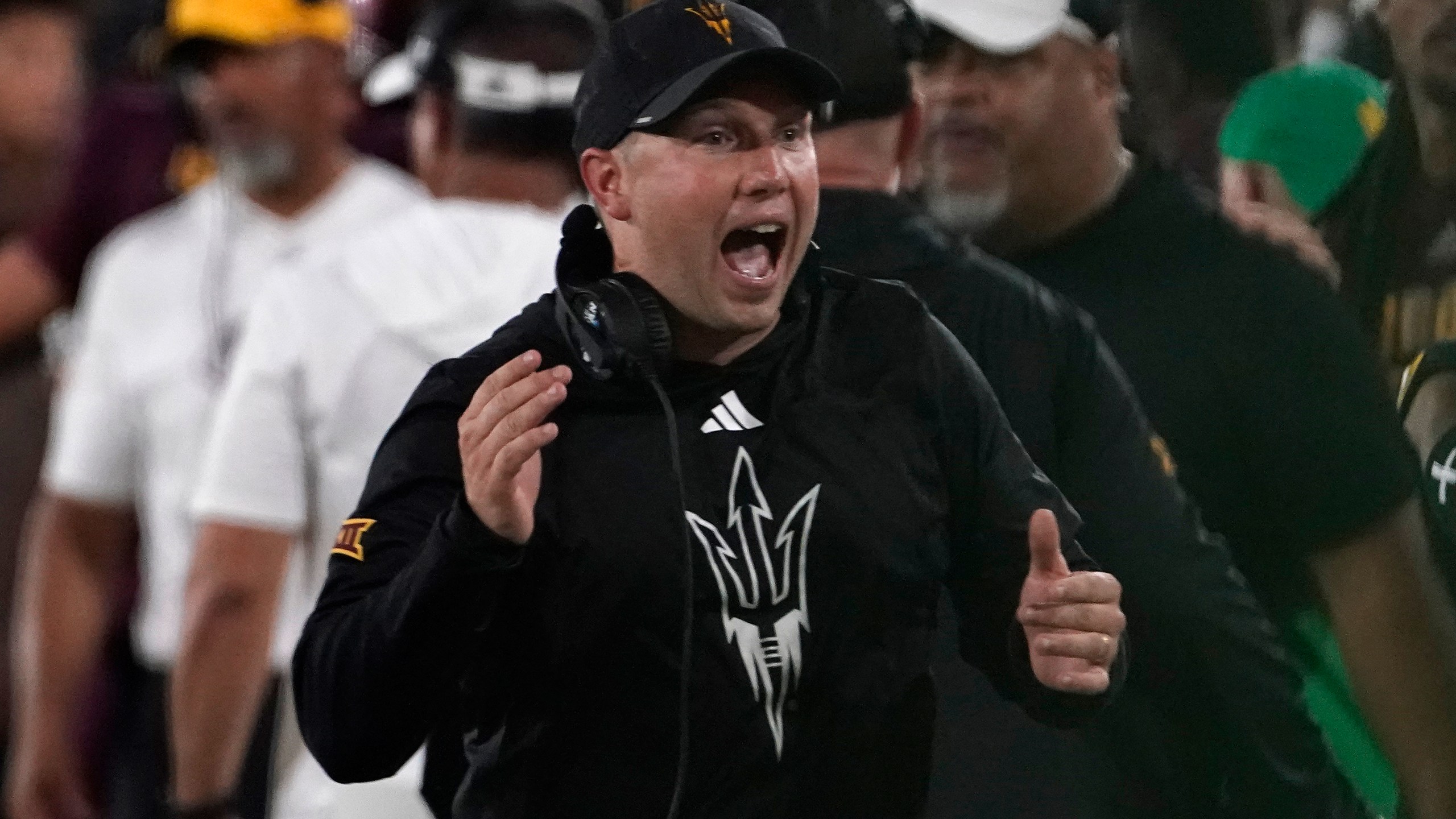 FILE - Arizona State head coach Kenny Dillingham celebrates a touchdown against Kansas during the second half of an NCAA college football game Saturday, Oct. 5, 2024, in Tempe, Ariz. (AP Photo/Darryl Webb, File)