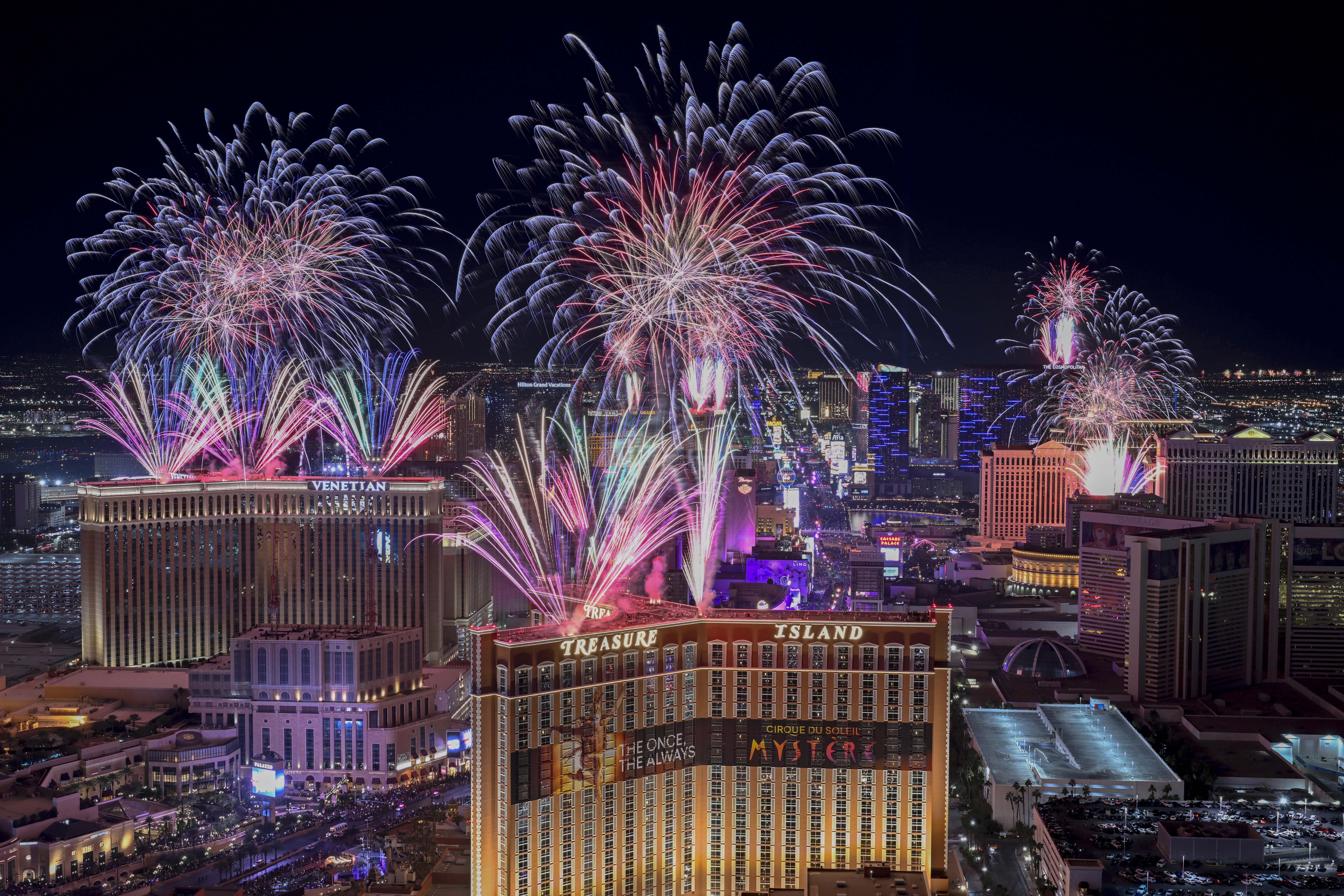 Fireworks explode over the Las Vegas Strip during a New Year's Eve celebration Wednesday, Jan. 1, 2025, in Las Vegas. (AP Photo/David Becker)