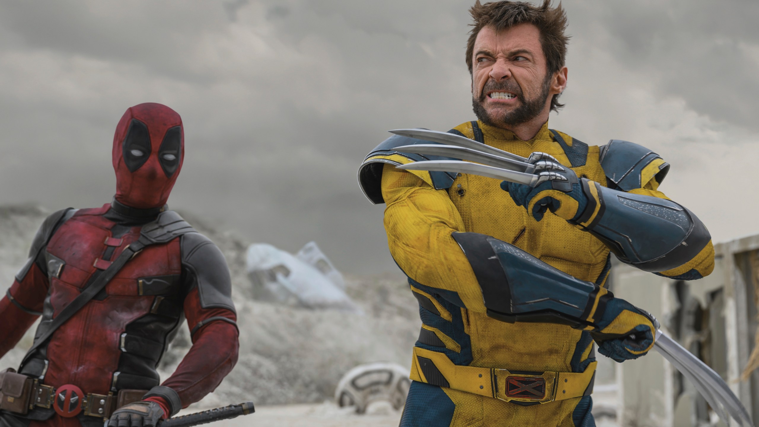 This image provided by The Walt Disney Studios shows the characters Deadpool, played by Ryan Reynolds, left, and Wolverine, played by Hugh Jackman, in a scene from the film "Deadpool & Wolverine," (The Walt Disney Studios via AP)